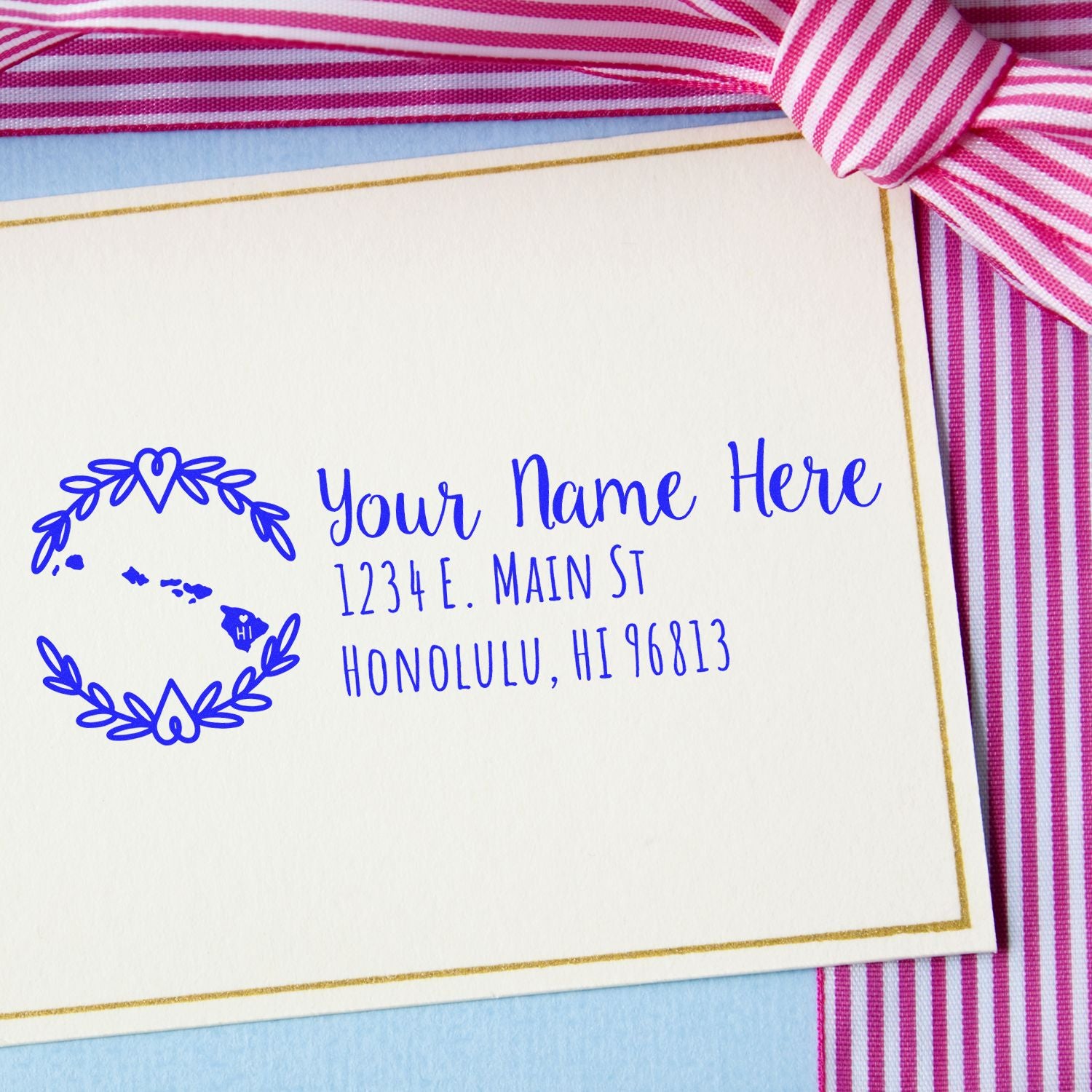 Hawaii State Custom Return Address Stamp on a card with a pink striped ribbon. Features a blue design with space for name and address, showcasing a map of Hawaii.