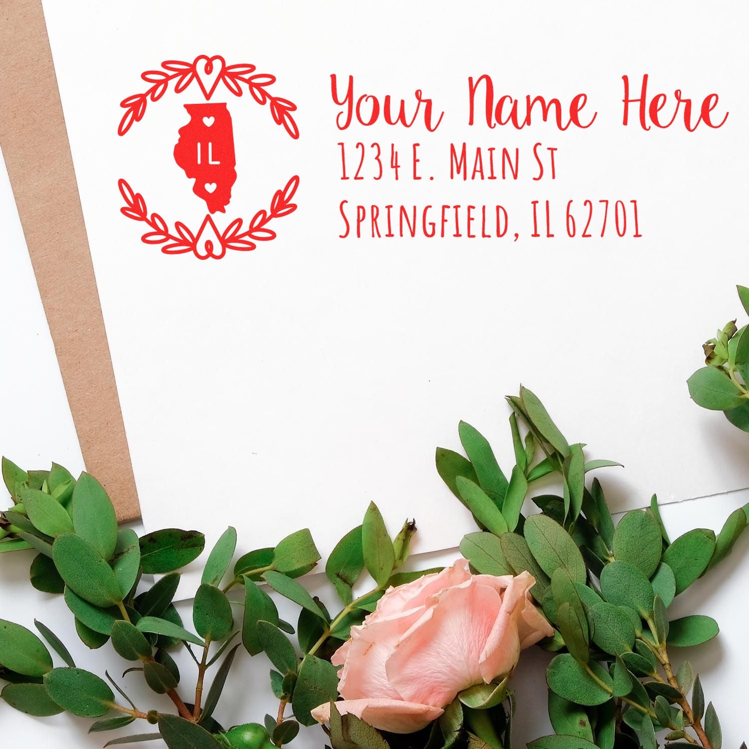 Illinois State Custom Return Address Stamp on an envelope with a red design featuring the state outline and hearts, surrounded by greenery and a pink rose.