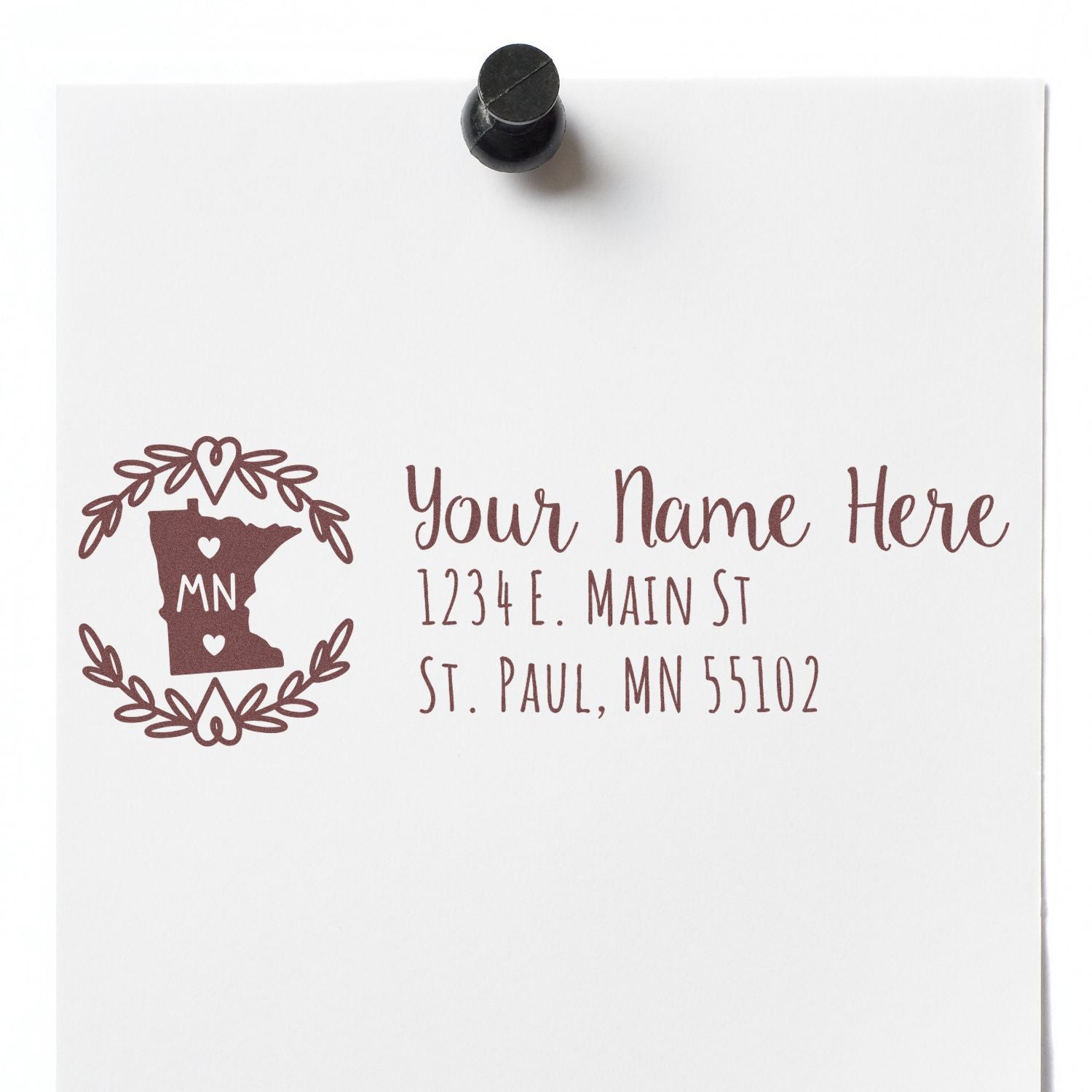 Minnesota State Custom Return Address Stamp on white paper, featuring a decorative state outline with hearts and space for personalized name and address in elegant font.