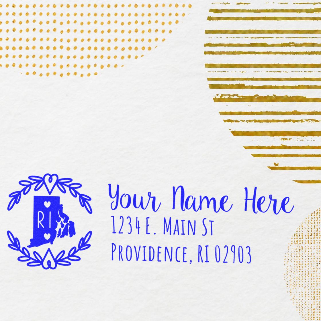 PSI Pre-Inked Rhode Island State Customized Address Stamp on paper, featuring a blue RI state design with space for name and address, surrounded by decorative gold patterns.