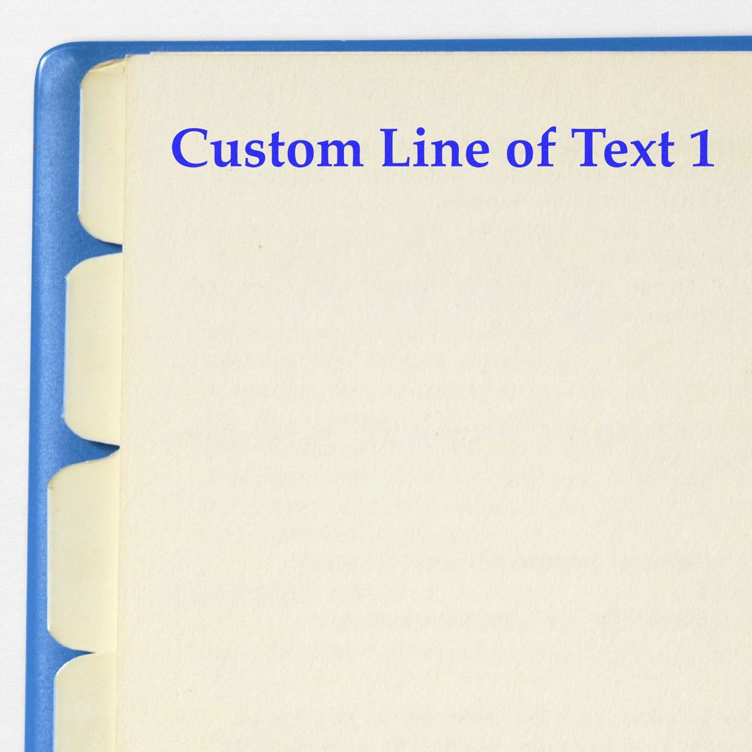 1 Line Custom Rubber Stamp with Wood Handle used to stamp 'Custom Line of Text 1' in blue ink on a page with tabbed dividers.