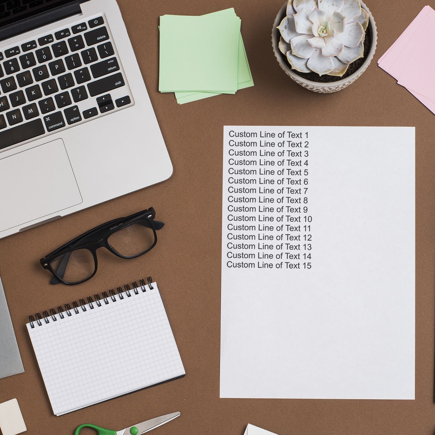 15-Line Custom Rubber Stamp with Wood Handle in use on a desk with a laptop, glasses, notepad, scissors, and a plant.