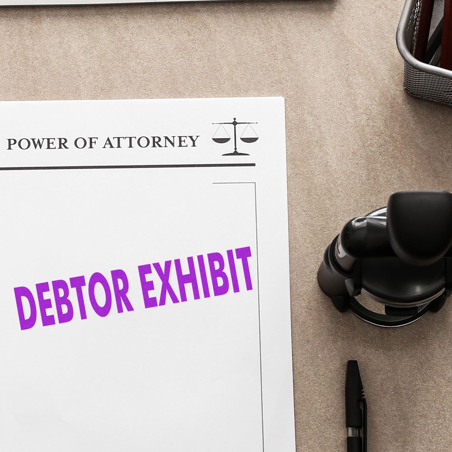 Large Pre-Inked Debtor Exhibit Stamp in purple ink on a legal document titled Power of Attorney, with a pen and office supplies nearby.