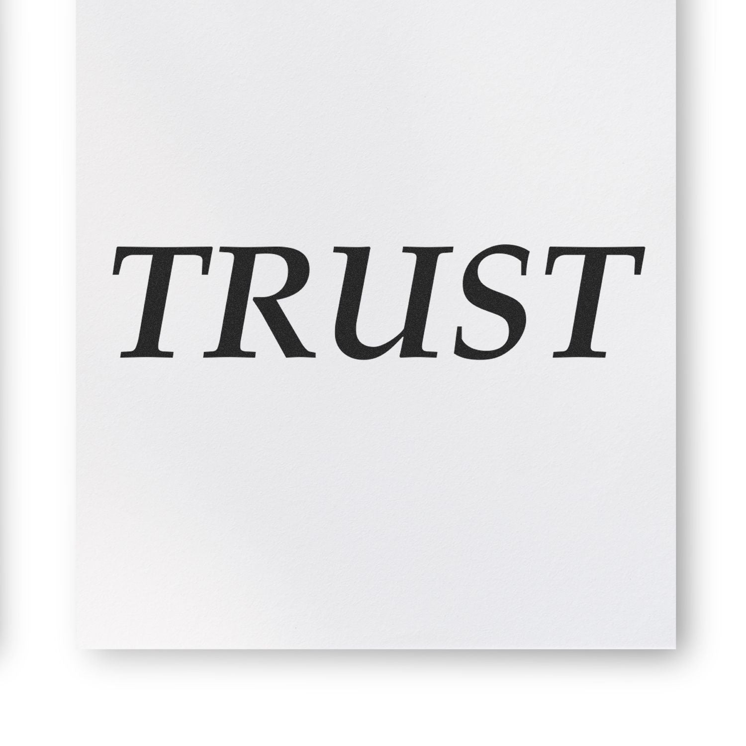 Large Pre-Inked Trust Stamp with bold black TRUST text on a white background, showcasing clear and sharp imprint quality.