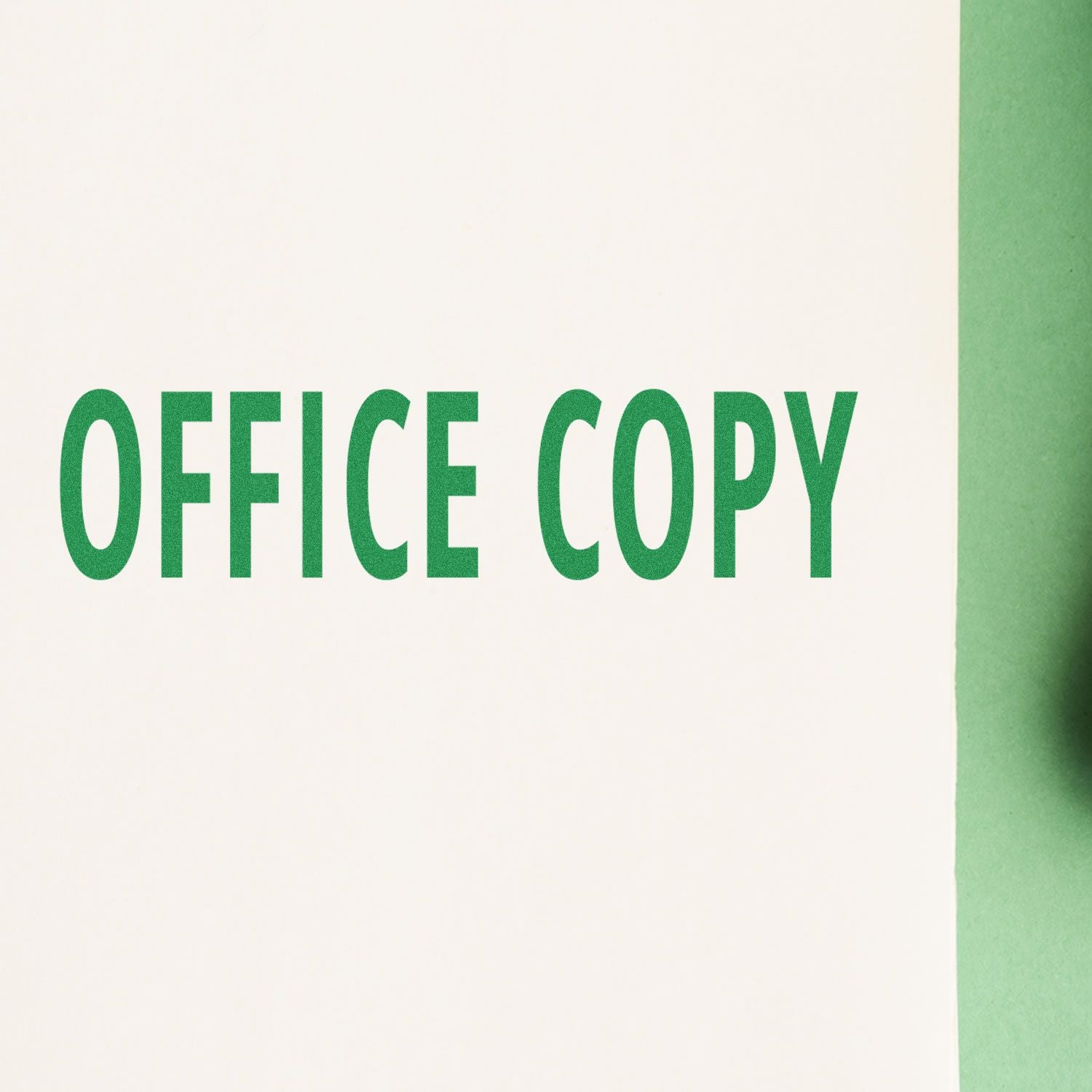 Large Pre-Inked Office Copy Stamp imprint in green on white paper, with a green background edge on the right side.