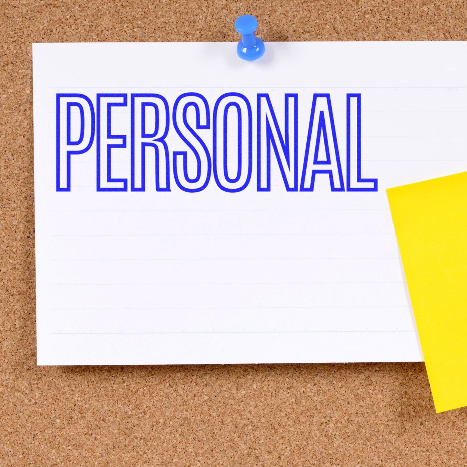 A corkboard with a note pinned by a blue pushpin, displaying the word PERSONAL in blue ink, stamped by the Large Pre-Inked Outline Personal Stamp.