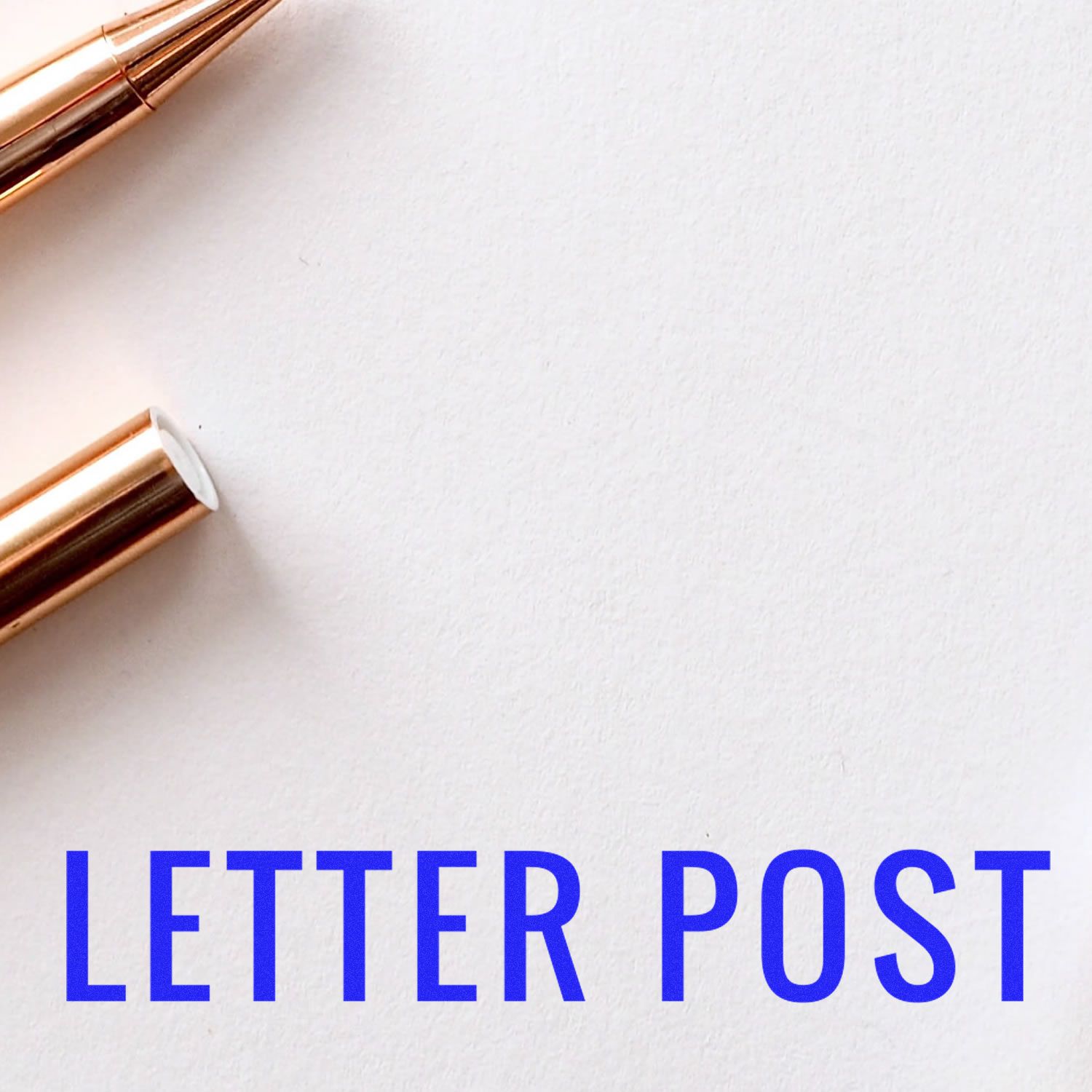 Large Pre-Inked Letter Post Stamp with a gold pen on a white background, featuring bold blue text 'LETTER POST' at the bottom."