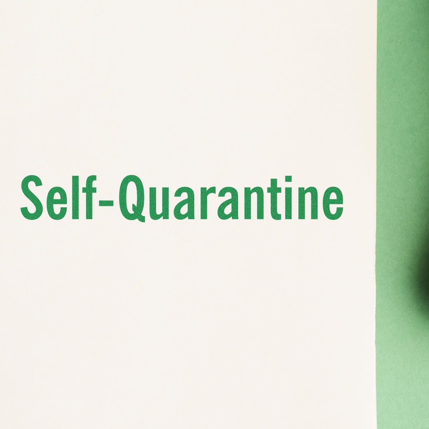 Image of a Large Self Inking Self-Quarantine Stamp imprinting the words Self-Quarantine in green ink on a white surface.