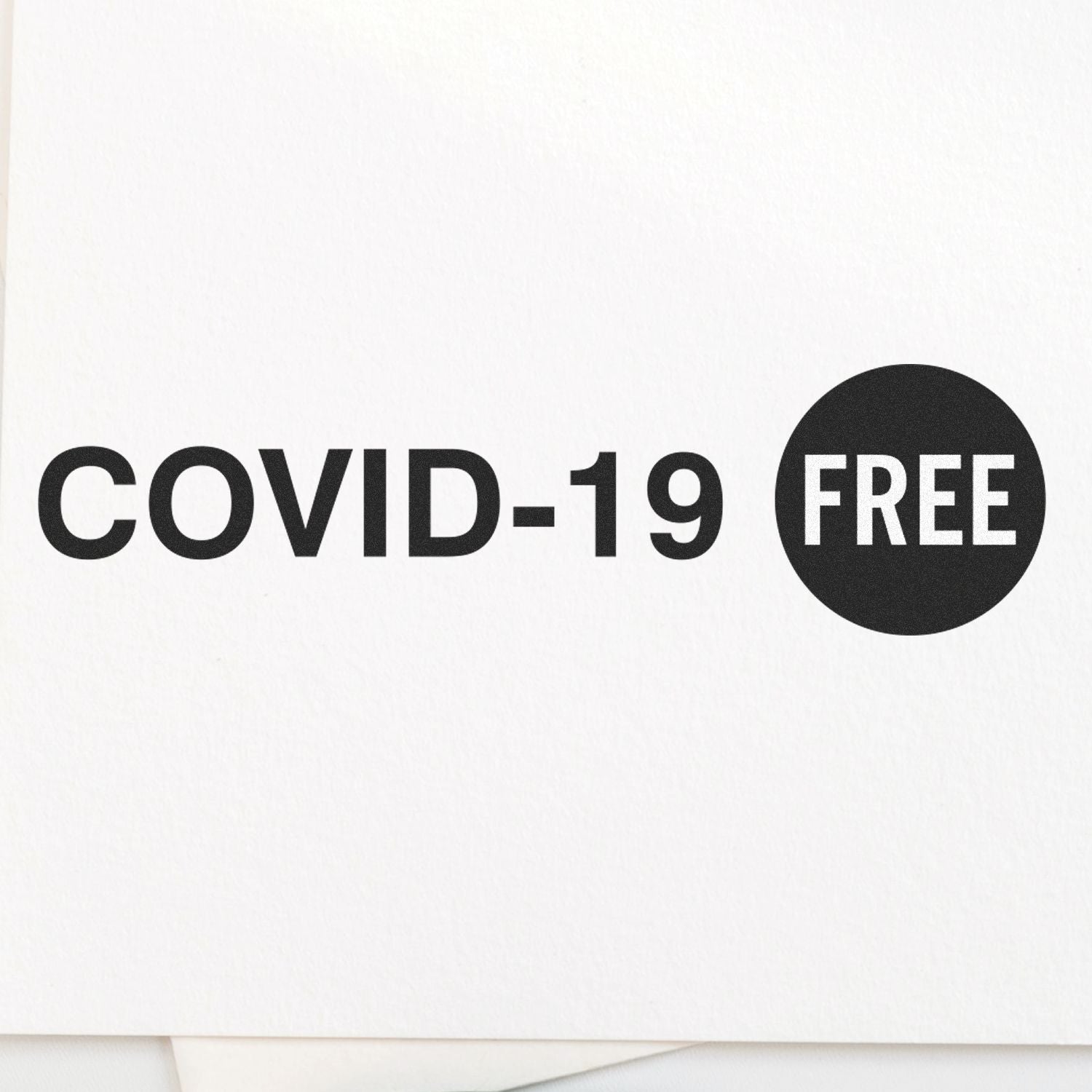 Large Self Inking Covid-19 Stamp with COVID-19 FREE text in black on white background.