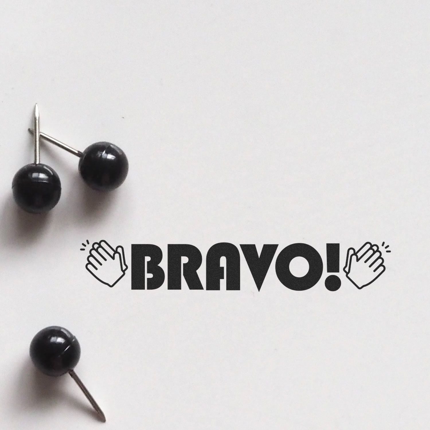 Large Pre-Inked Bravo with Hands Stamp on white background, featuring bold BRAVO! text with clapping hands icons on either side.