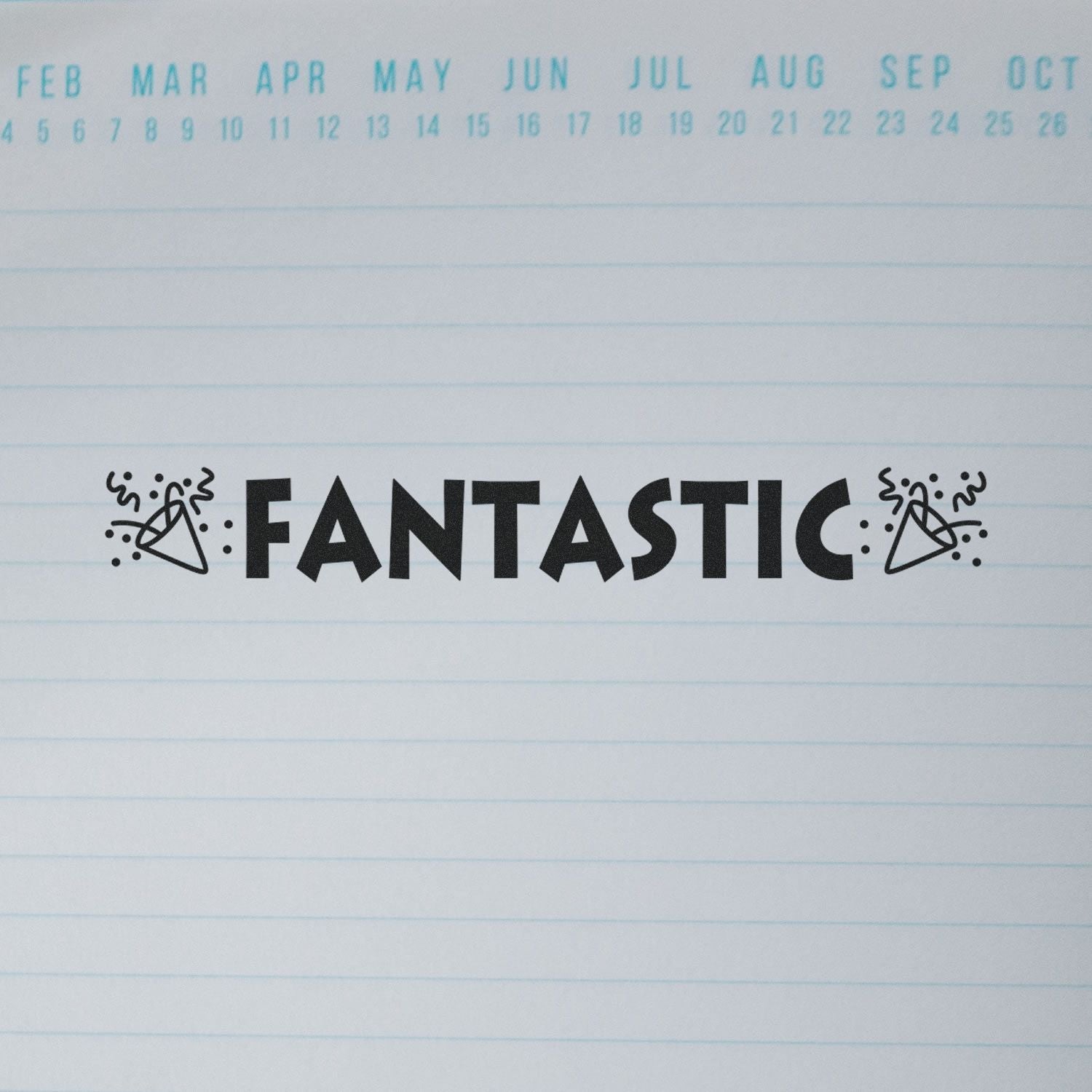 Large Pre-Inked Fantastic with Icons Stamp on a lined paper, featuring the word FANTASTIC with celebratory icons on both sides.