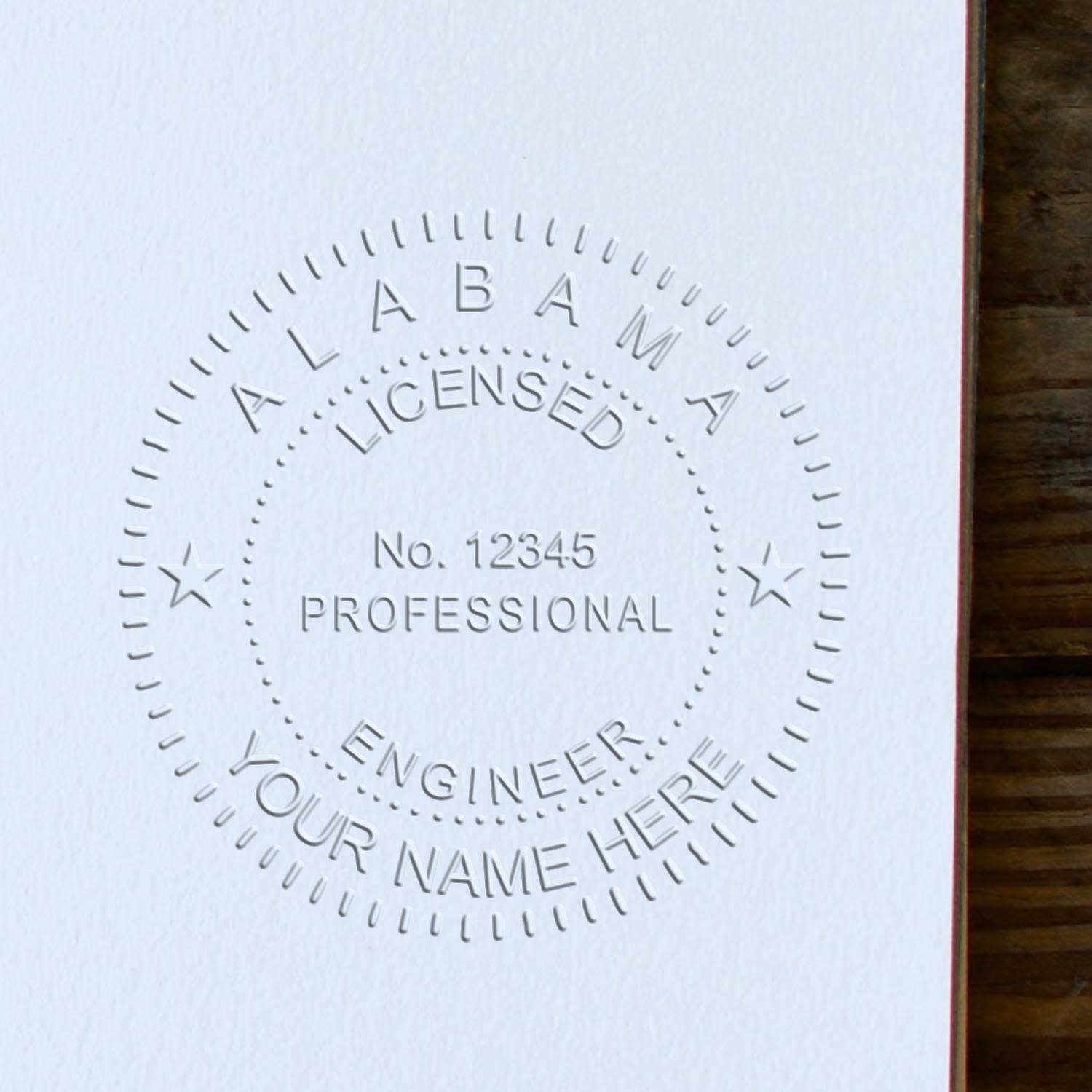 The State of Alabama Extended Long Reach Engineer Seal stamp impression comes to life with a crisp, detailed photo on paper - showcasing true professional quality.