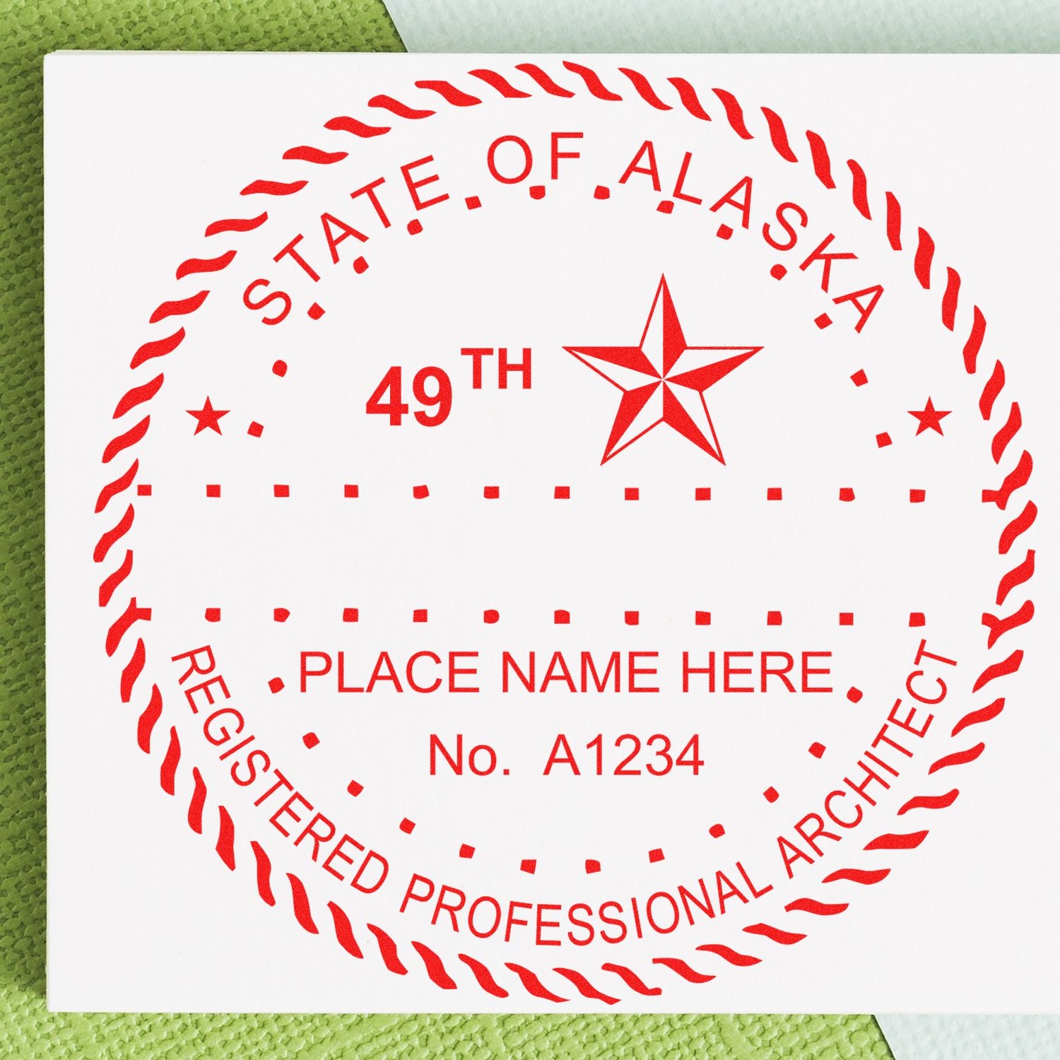 Self Inking Alaska Architect Stamp in red ink on white paper, featuring the text STATE OF ALASKA and REGISTERED PROFESSIONAL ARCHITECT.