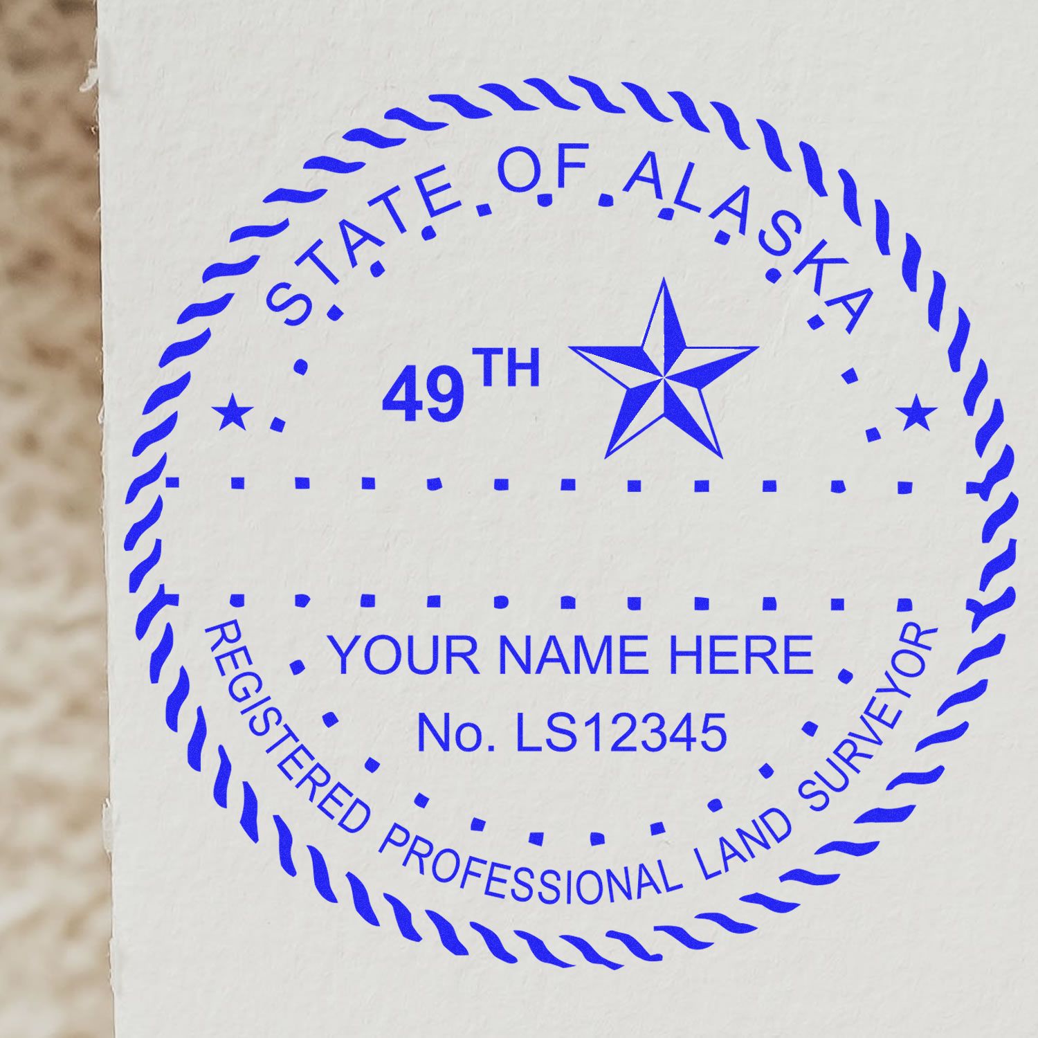 Premium MaxLight Pre-Inked Alaska Surveyors Stamp with customizable text and registration number for professional land surveyors in Alaska.