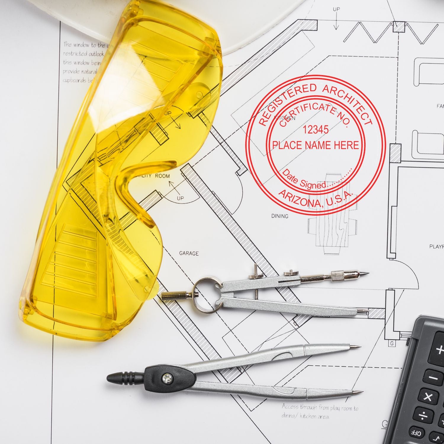 Yellow safety glasses, drafting tools, and a calculator on a blueprint with a red Arizona Architect Seal Stamp.