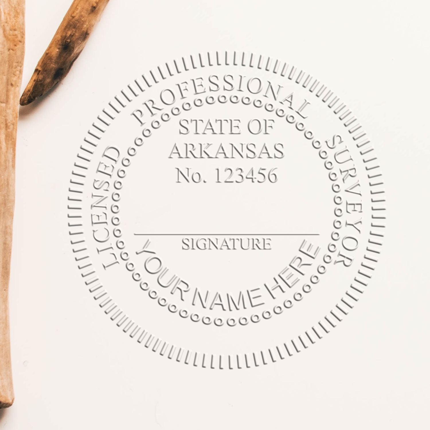 A photograph of the Hybrid Arkansas Land Surveyor Seal stamp impression reveals a vivid, professional image of the on paper.