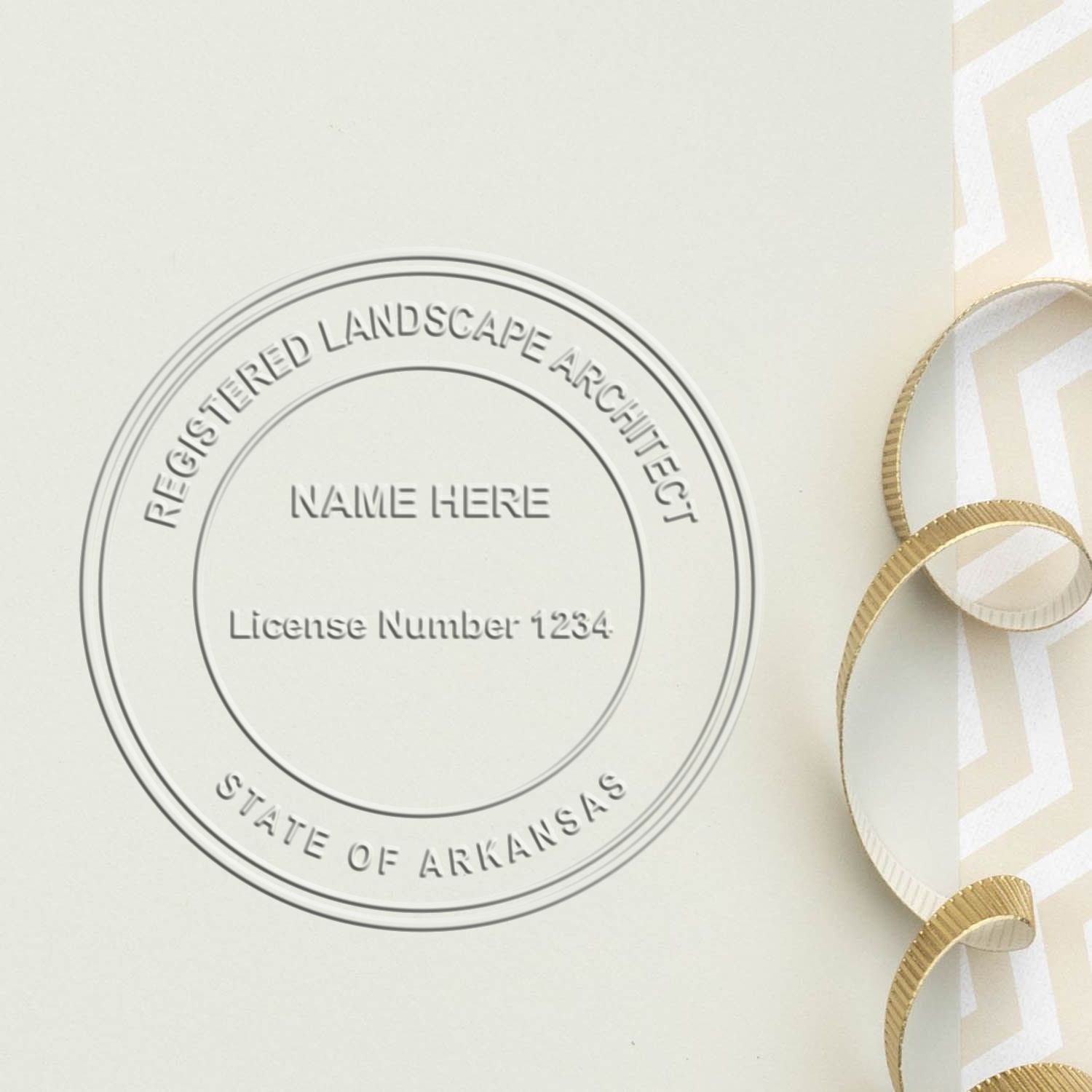 An in use photo of the Hybrid Arkansas Landscape Architect Seal showing a sample imprint on a cardstock