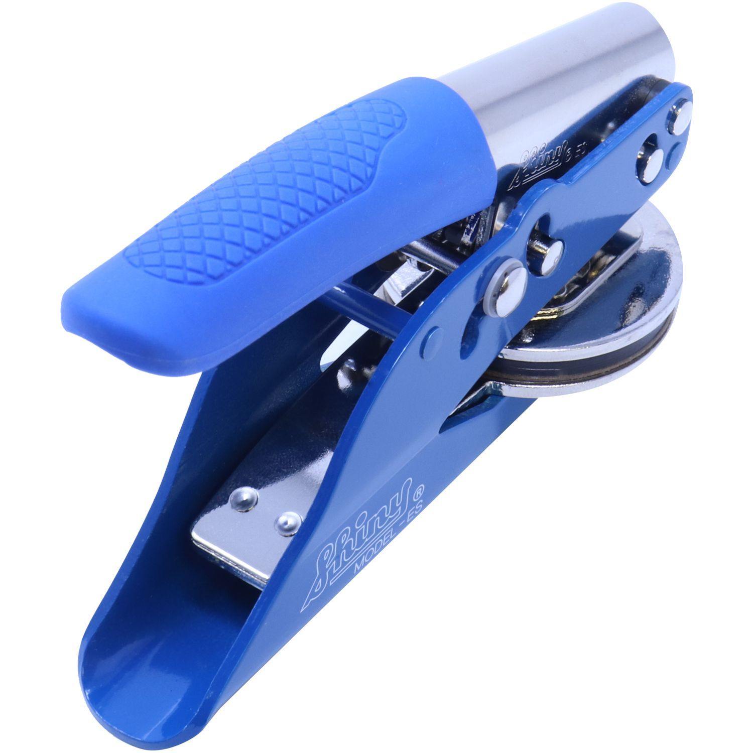 Real Estate Appraiser Blue Soft Seal Embosser with a blue handle and metal components, angled back-side view, showing the embossing mechanism.