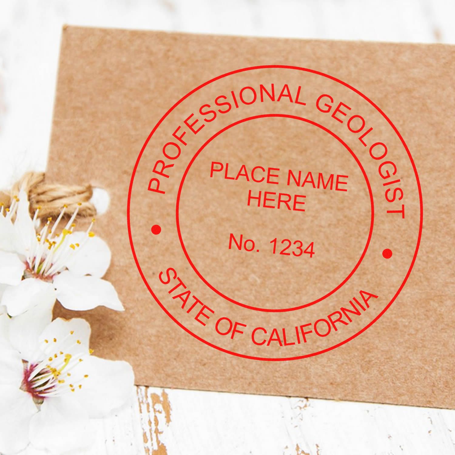 An in use photo of the Slim Pre-Inked California Professional Geologist Seal Stamp showing a sample imprint on a cardstock