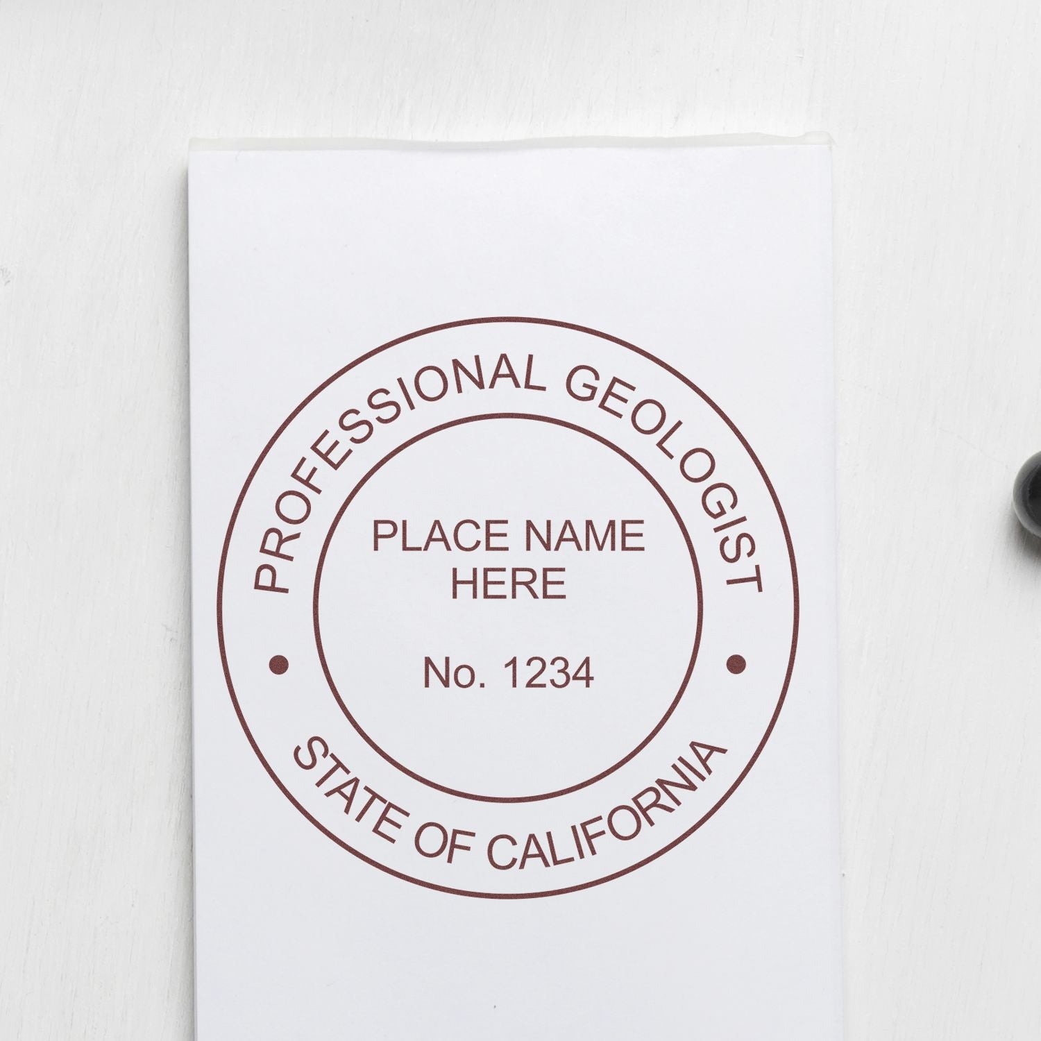 Another Example of a stamped impression of the Slim Pre-Inked California Professional Geologist Seal Stamp on a office form