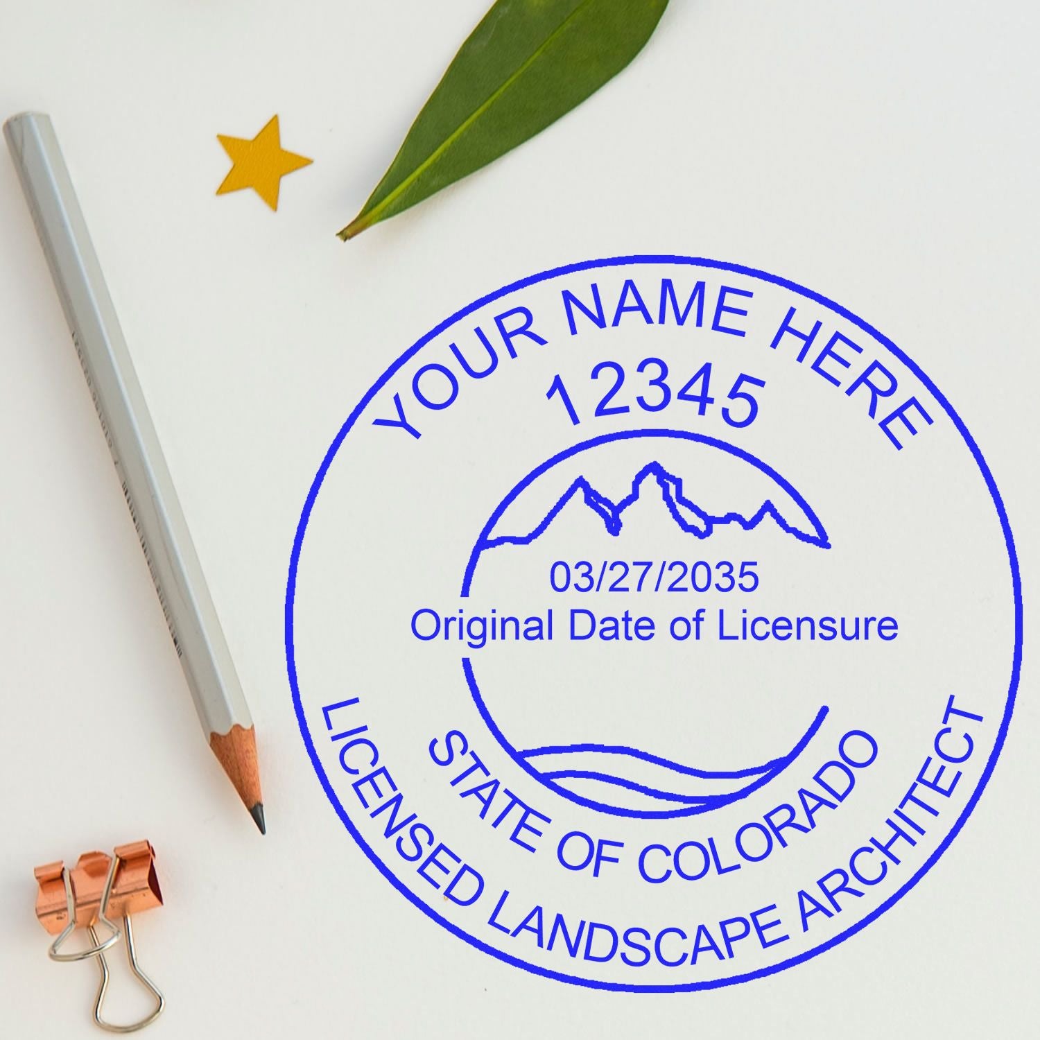 This paper is stamped with a sample imprint of the Self-Inking Colorado Landscape Architect Stamp, signifying its quality and reliability.