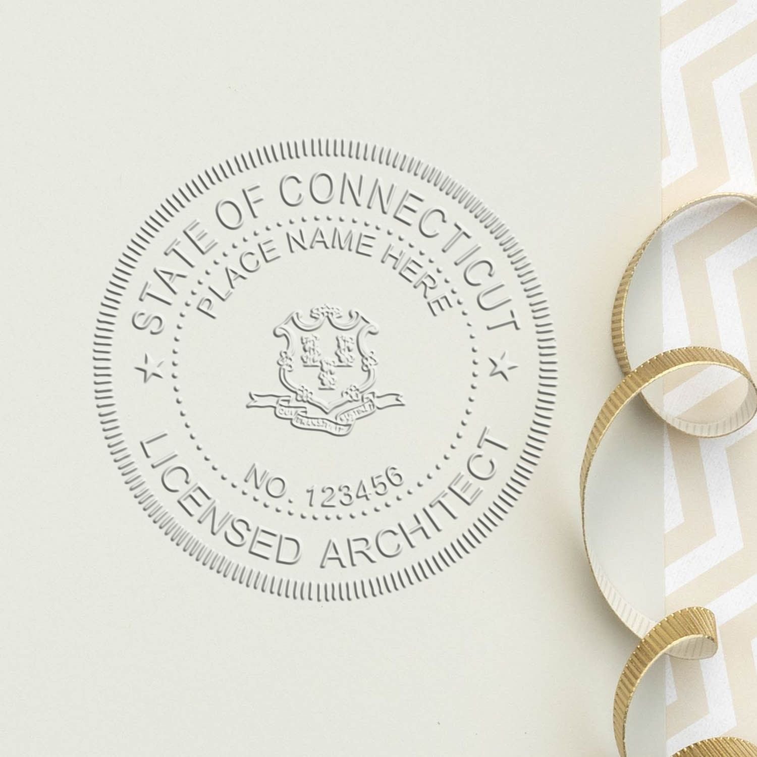 This paper is stamped with a sample imprint of the Extended Long Reach Connecticut Architect Seal Embosser, signifying its quality and reliability.