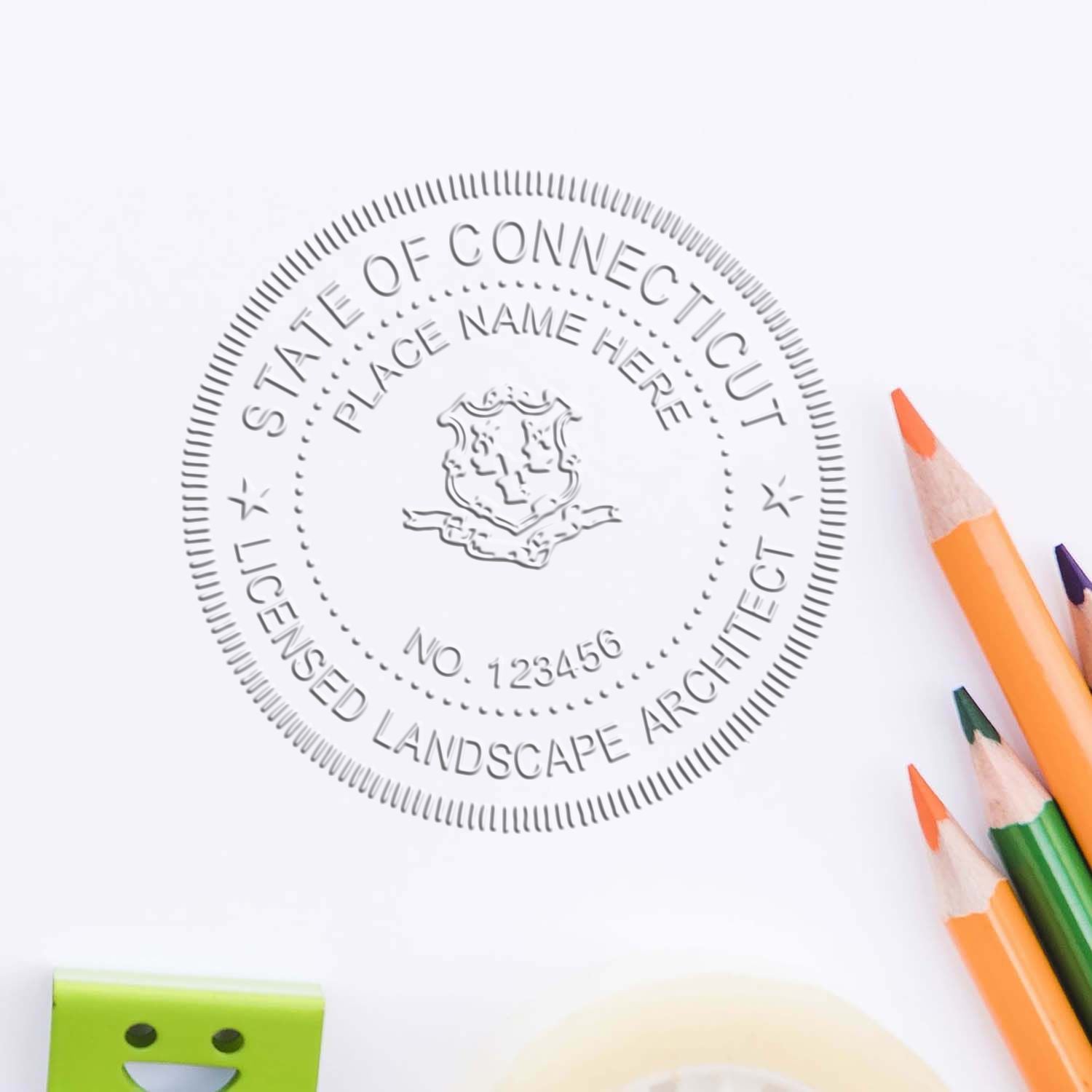 A stamped impression of the State of Connecticut Handheld Landscape Architect Seal in this stylish lifestyle photo, setting the tone for a unique and personalized product.