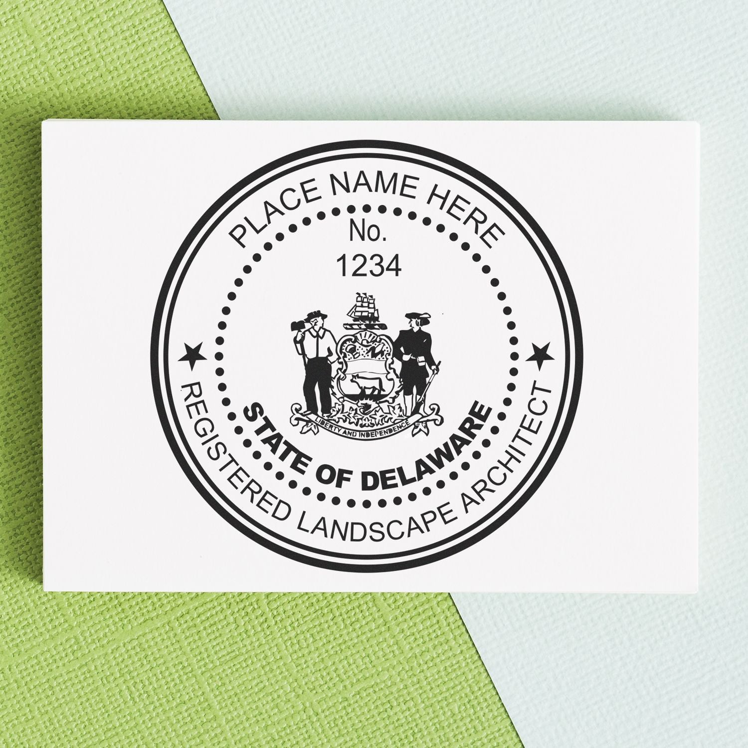 A lifestyle photo showing a stamped image of the Delaware Landscape Architectural Seal Stamp on a piece of paper