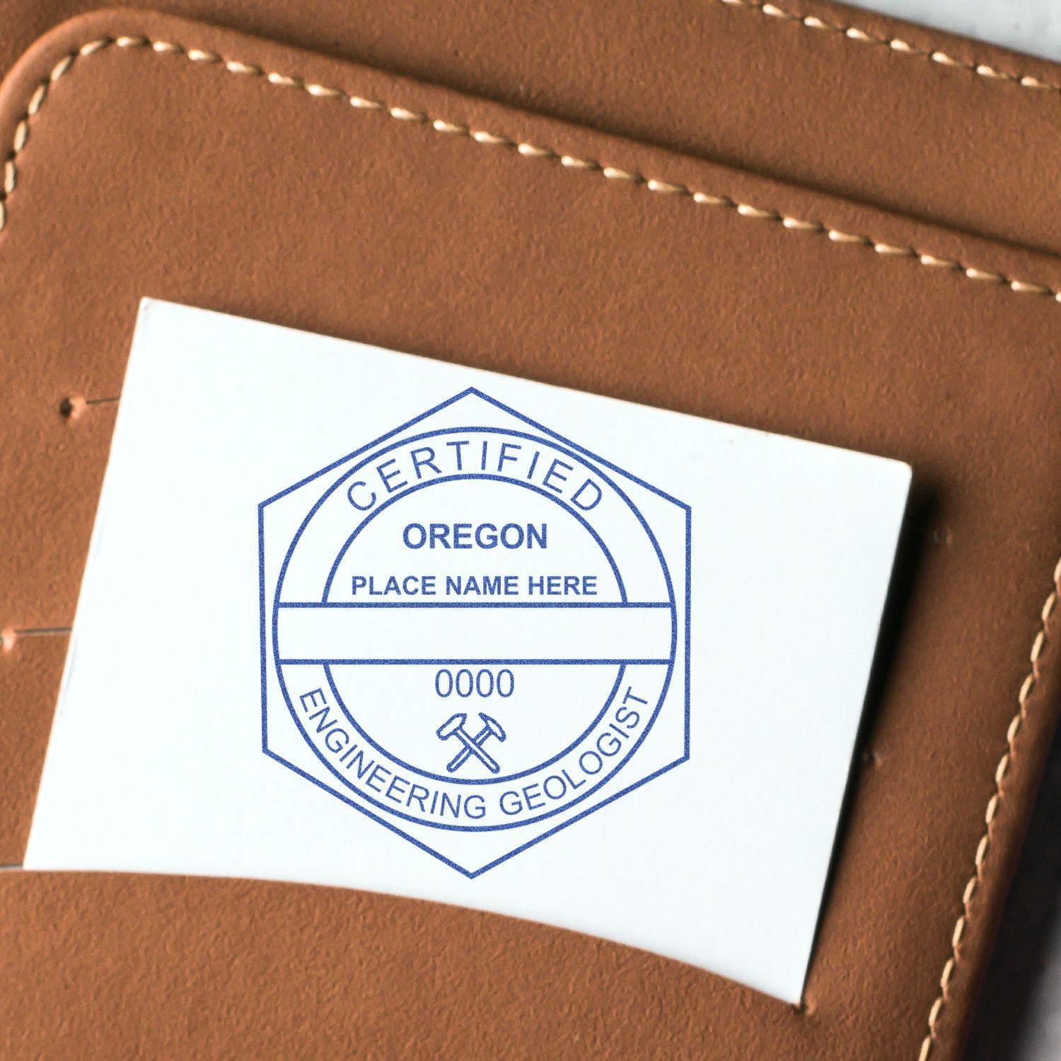 Engineering Geologist eSeal Electronic Image Stamp of Seal on a white card, placed in a brown leather wallet.