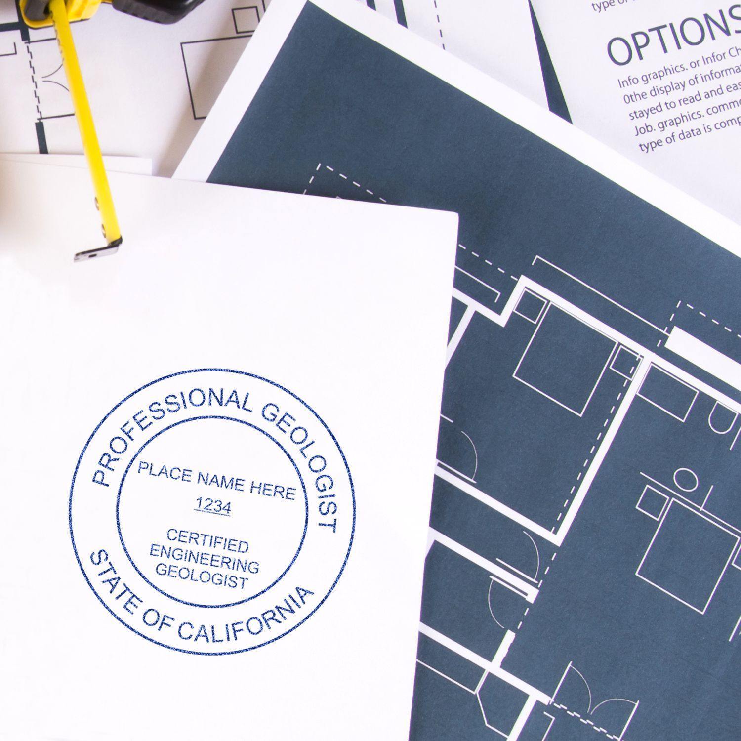 Xstamper Engineering Geologist Pre-Inked Rubber Stamp of Seal used on a document, with architectural blueprints in the background.