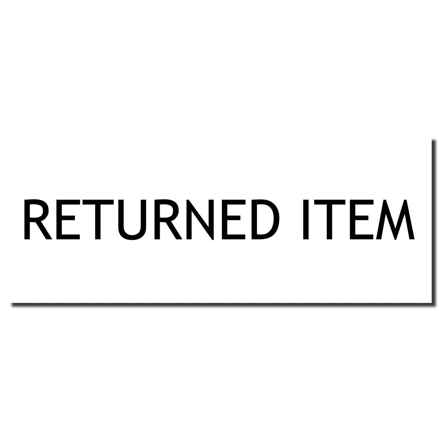 Image of a Slim Pre-Inked Returned Item Stamp imprint displaying the text 'RETURNED ITEM' in bold black letters on a white background.