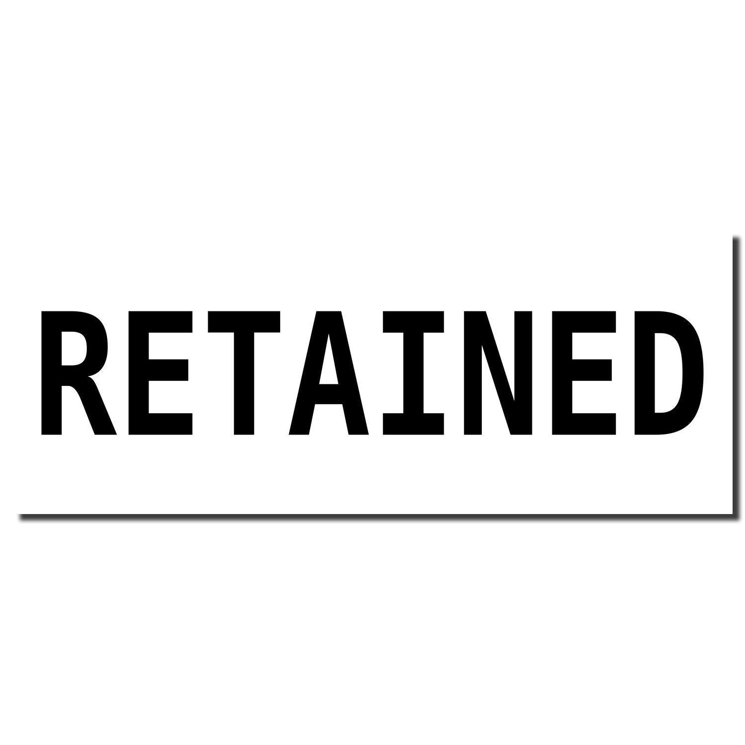 Image of a Slim Pre-Inked Retained Stamp imprint with the word 'RETAINED' in bold black letters on a white background.