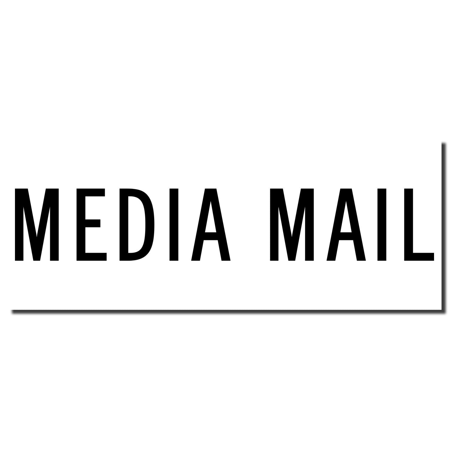 Self Inking Media Mail Stamp imprint in black ink on white background, displaying the words MEDIA MAIL with a horizontal line underneath.