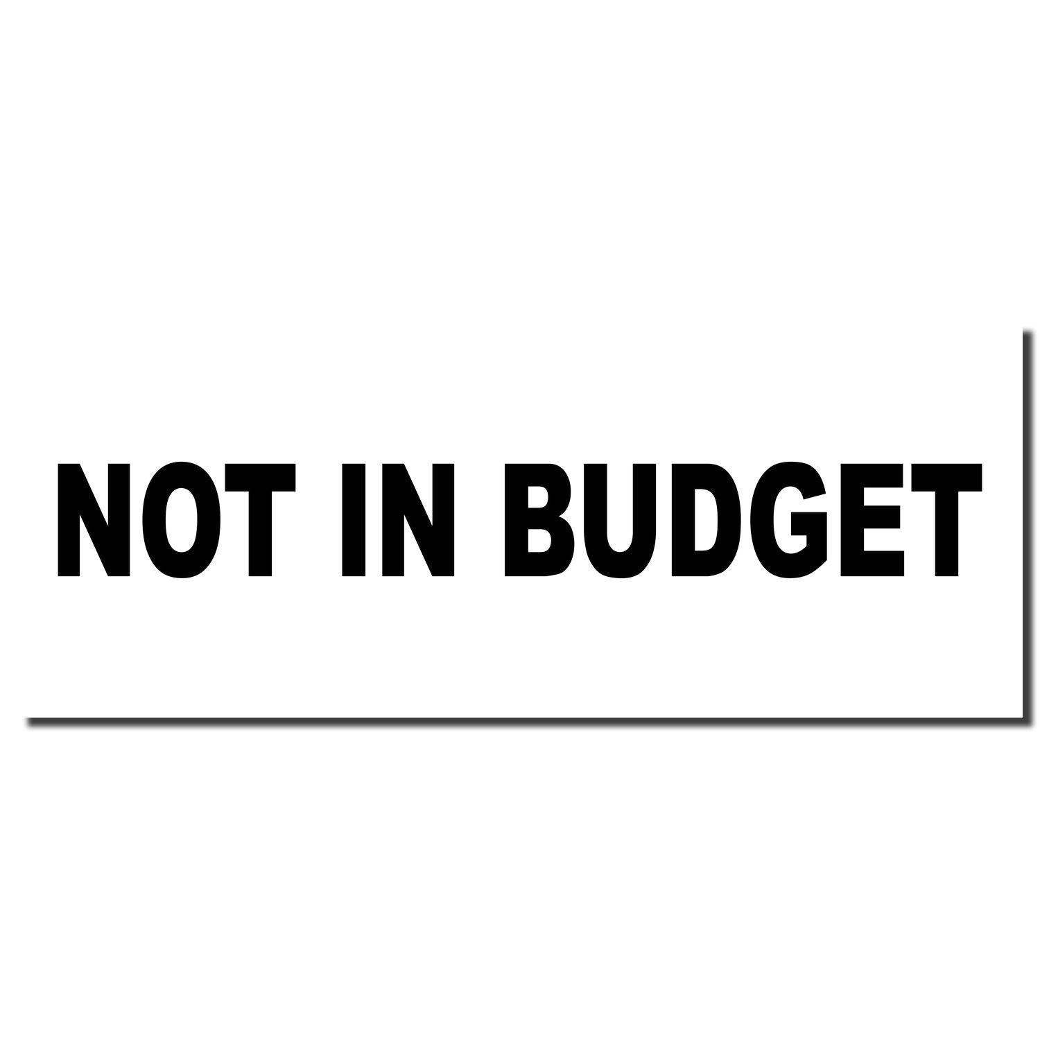 Image of a Large Not In Budget Rubber Stamp imprint in bold black letters on a white background.