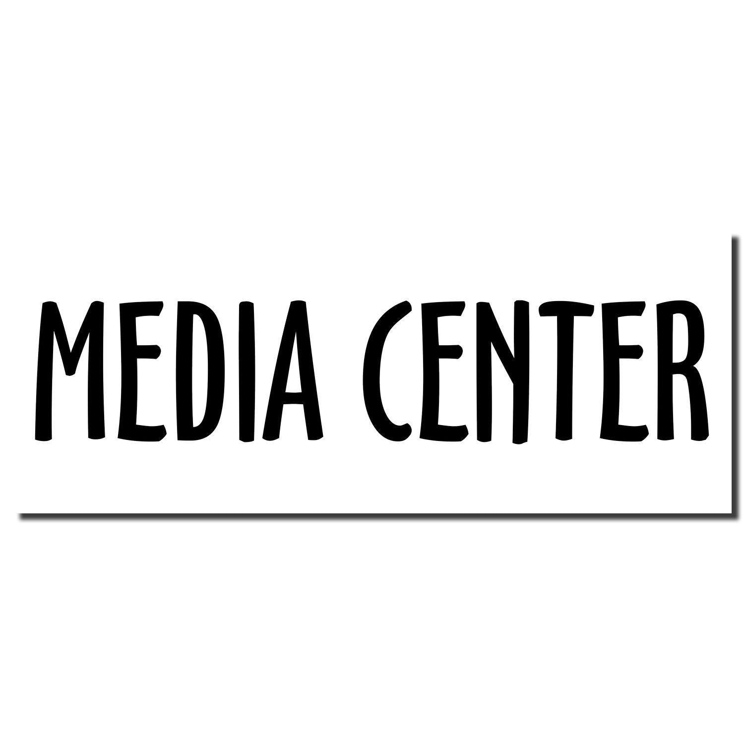 Black Large Self Inking Media Center Stamp imprint on white background with bold, uppercase letters spelling 'MEDIA CENTER'.