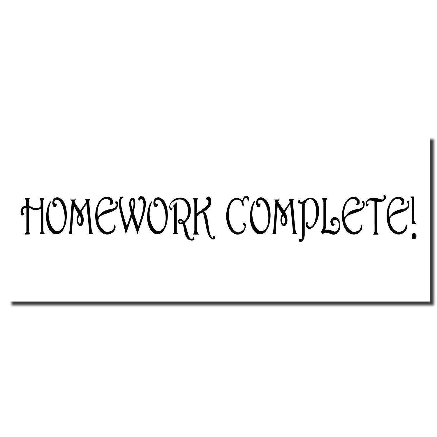 Large Self Inking Homework Complete Stamp imprint in black ink on a white background, displaying the text HOMEWORK COMPLETE! in decorative font.