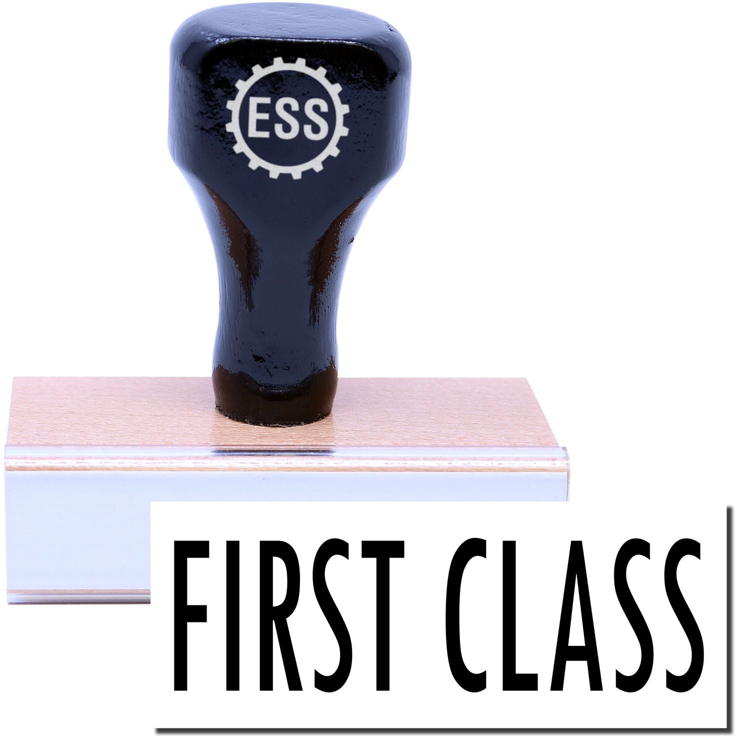 A stock office rubber stamp with a stamped image showing how the text FIRST CLASS in a large font is displayed after stamping.