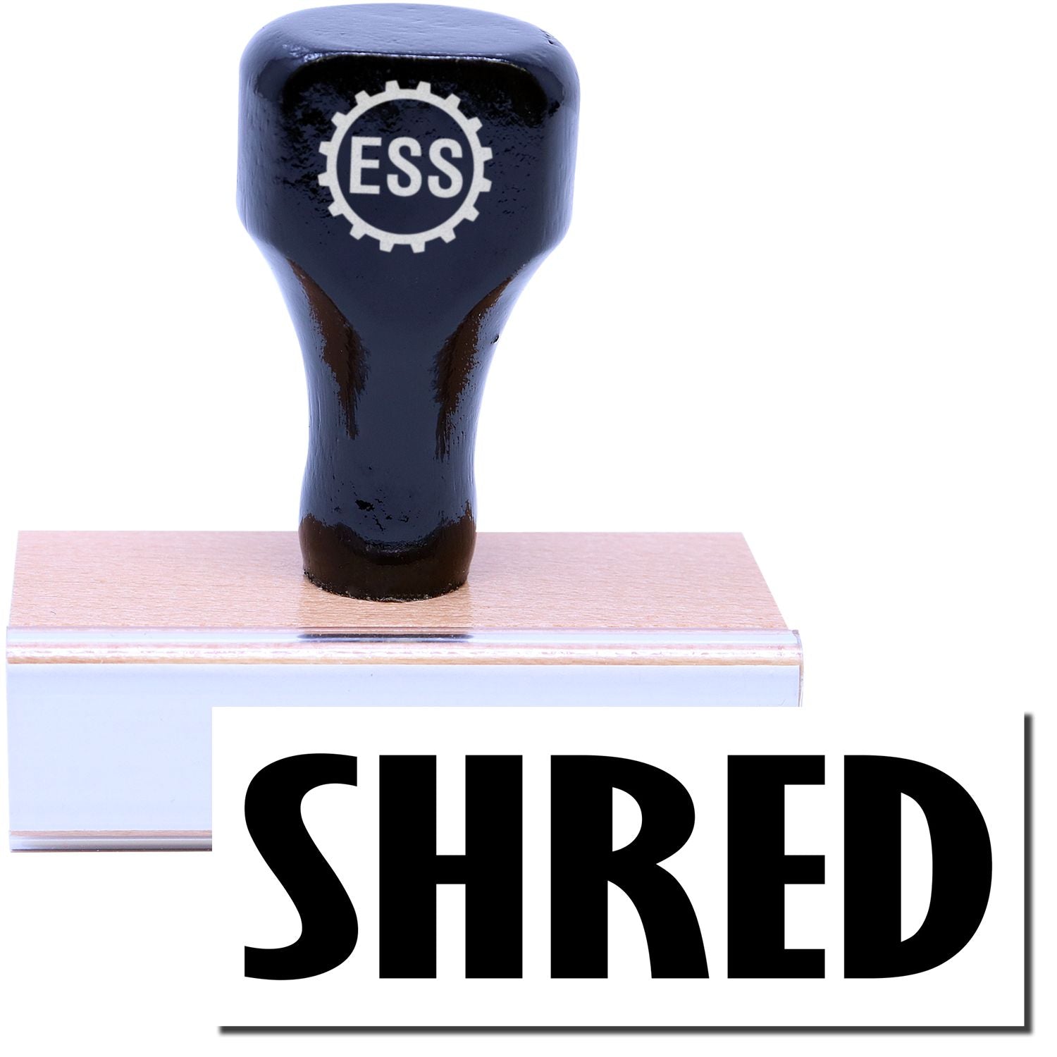 A stock office rubber stamp with a stamped image showing how the text SHRED is displayed after stamping.