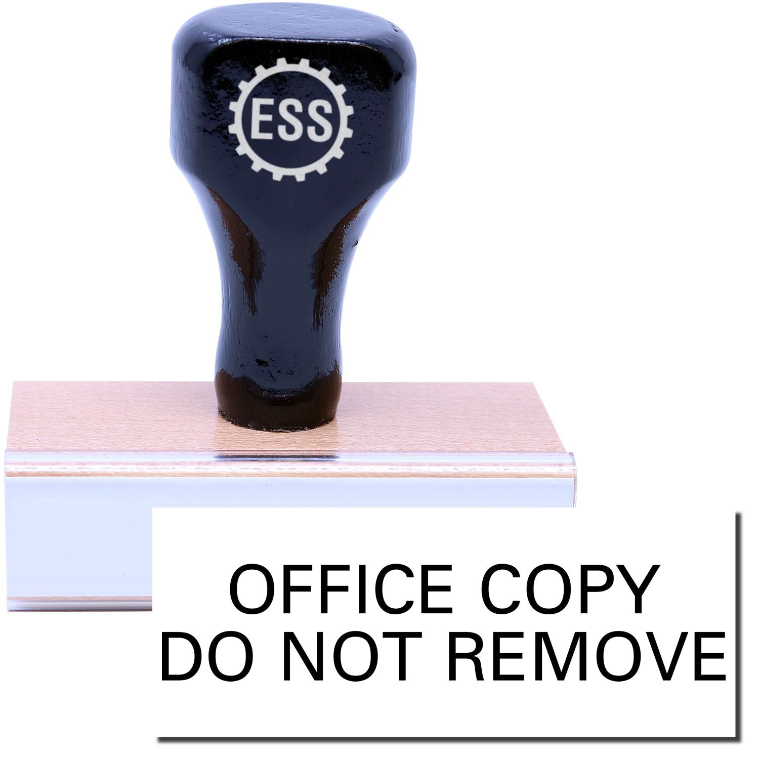 A stock office rubber stamp with a stamped image showing how the text OFFICE COPY DO NOT REMOVE is displayed after stamping.