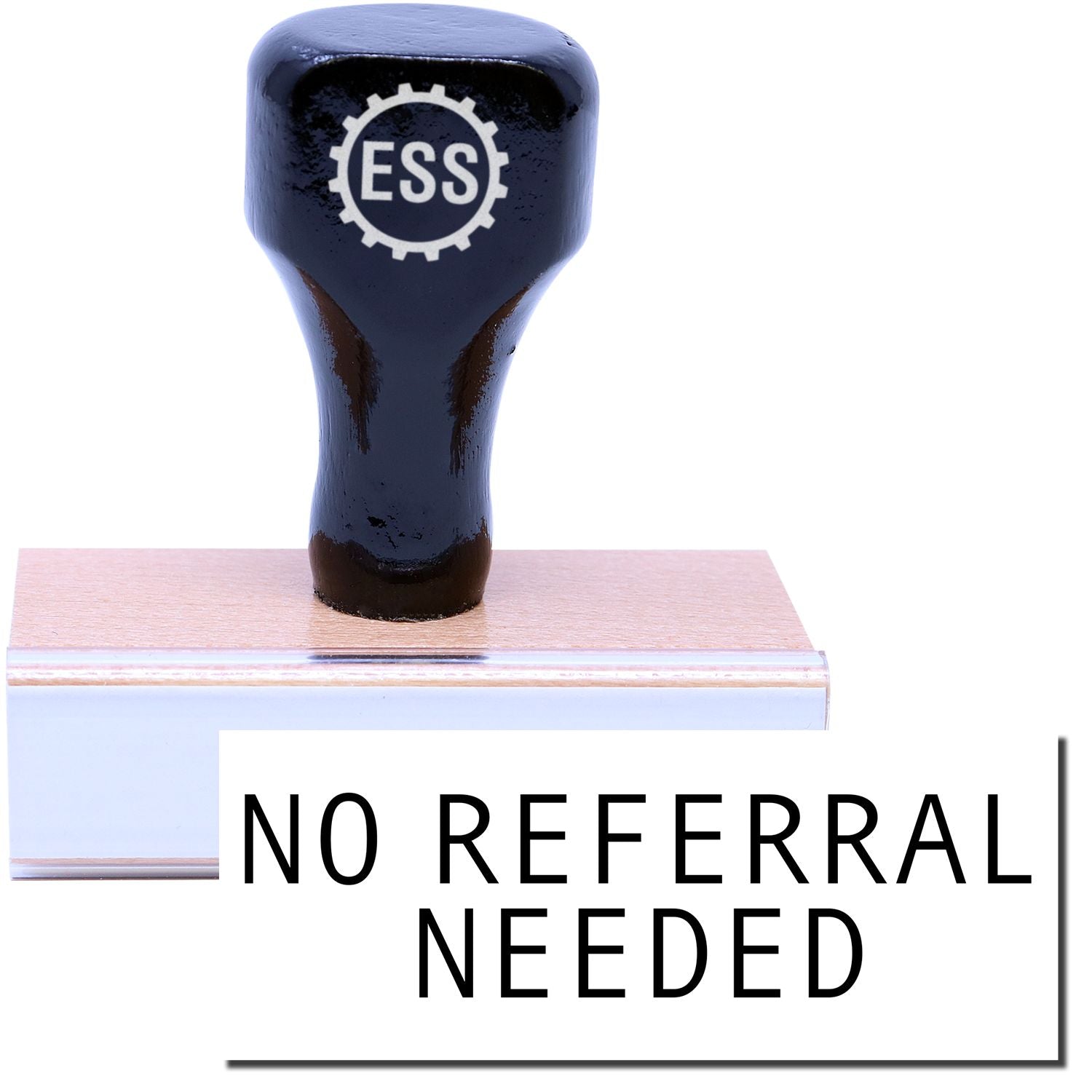 A stock office rubber stamp with a stamped image showing how the text "NO REFERRAL NEEDED" in a large font is displayed after stamping.