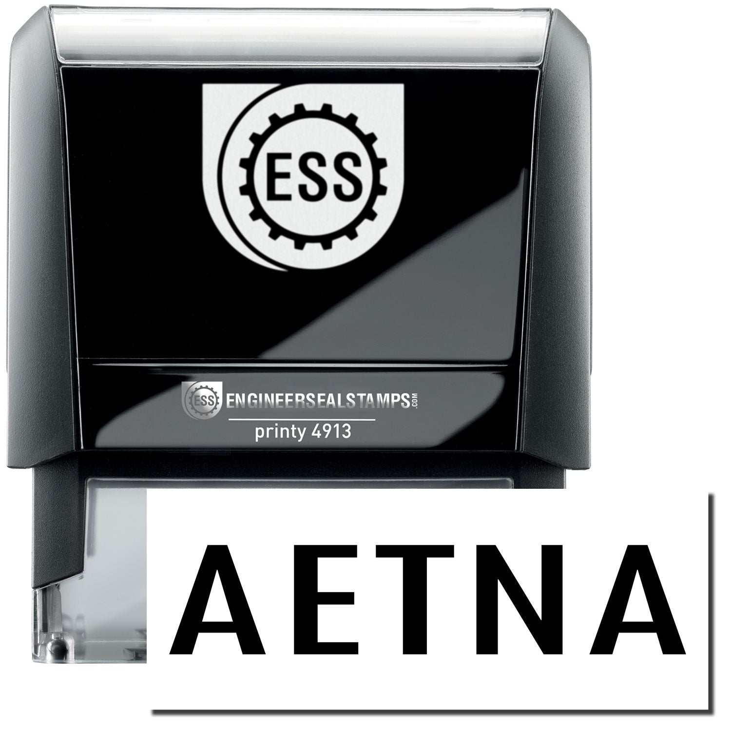 A self-inking stamp with a stamped image showing how the text "AETNA" in a large bold font is displayed by it.