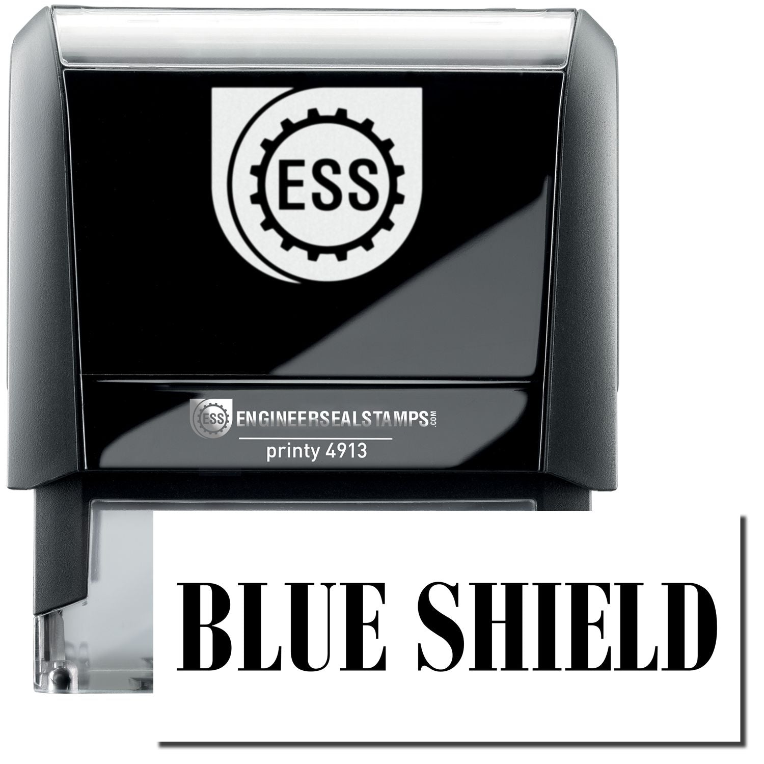 A self-inking stamp with a stamped image showing how the text BLUE SHIELD in a large bold font is displayed by it.