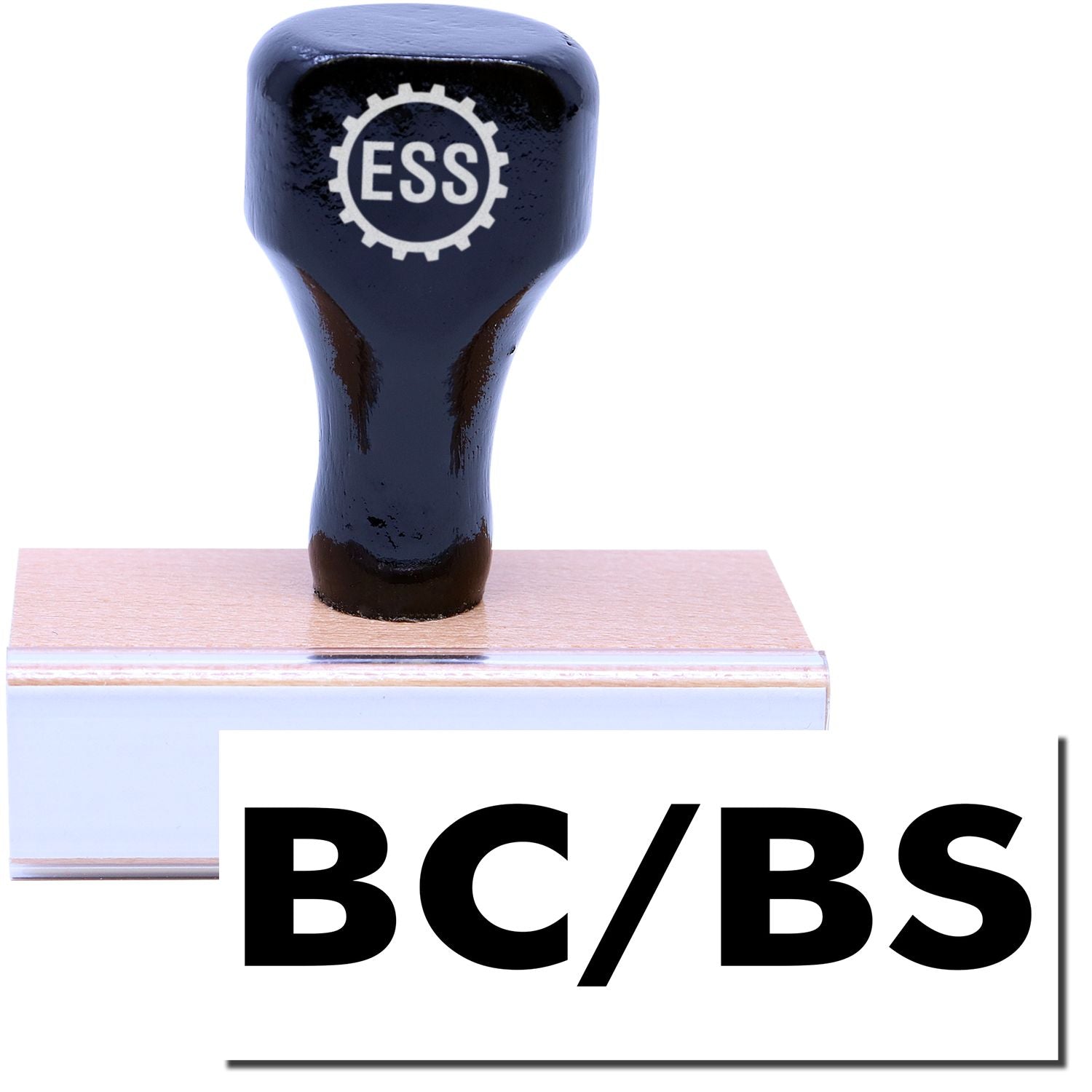 A stock office rubber stamp with a stamped image showing how the text BC/BS in a large font is displayed after stamping.