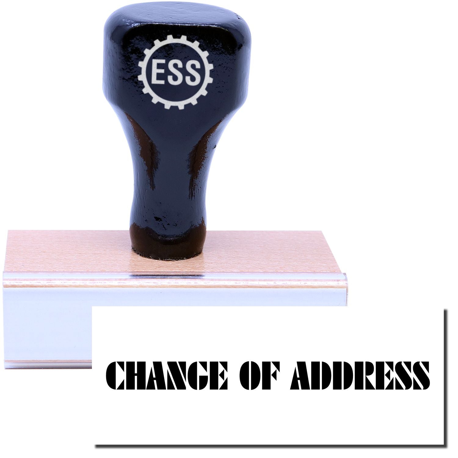 A stock office rubber stamp with a stamped image showing how the text "CHANGE OF ADDRESS" in a large font is displayed after stamping.