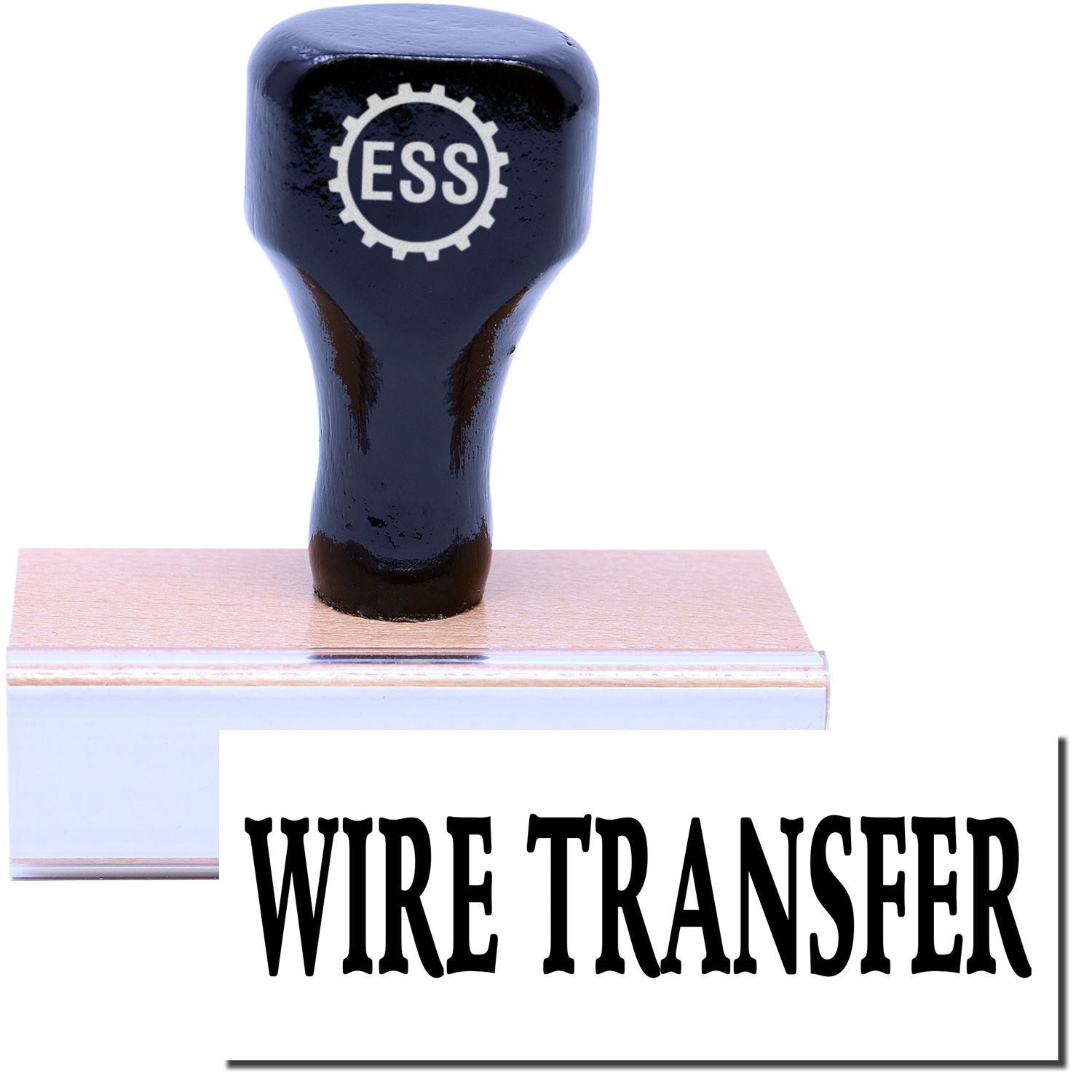 A stock office rubber stamp with a stamped image showing how the text WIRE TRANSFER in a large font is displayed after stamping.