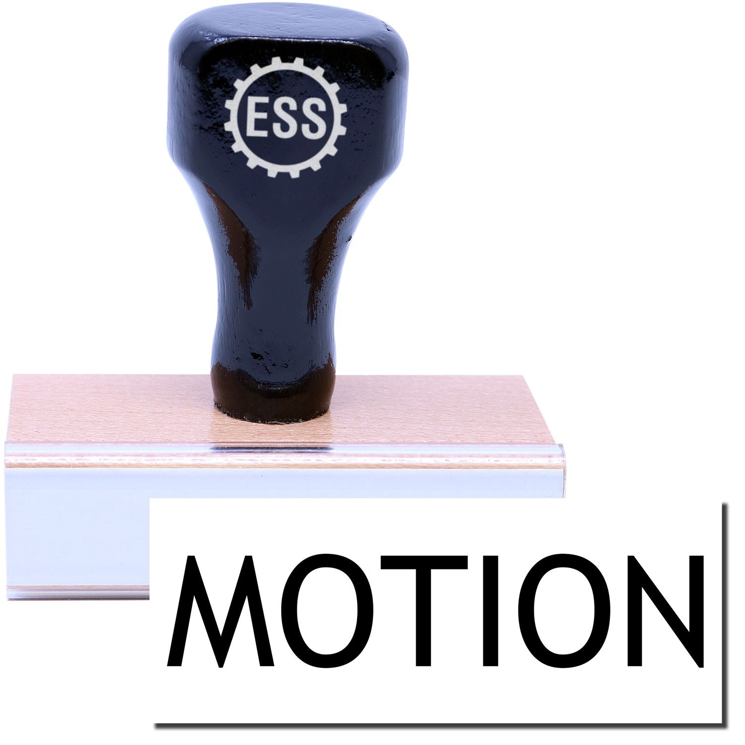 A stock office rubber stamp with a stamped image showing how the text MOTION in a large font is displayed after stamping.