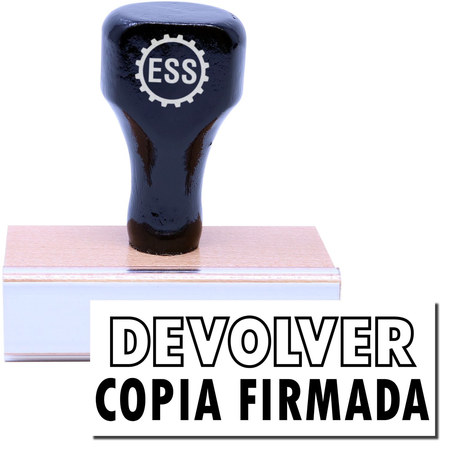 A stock office rubber stamp with a stamped image showing how the text DEVOLVER COPIA FIRMADA ( DEVOLVER in an outline font) is displayed after stamping.