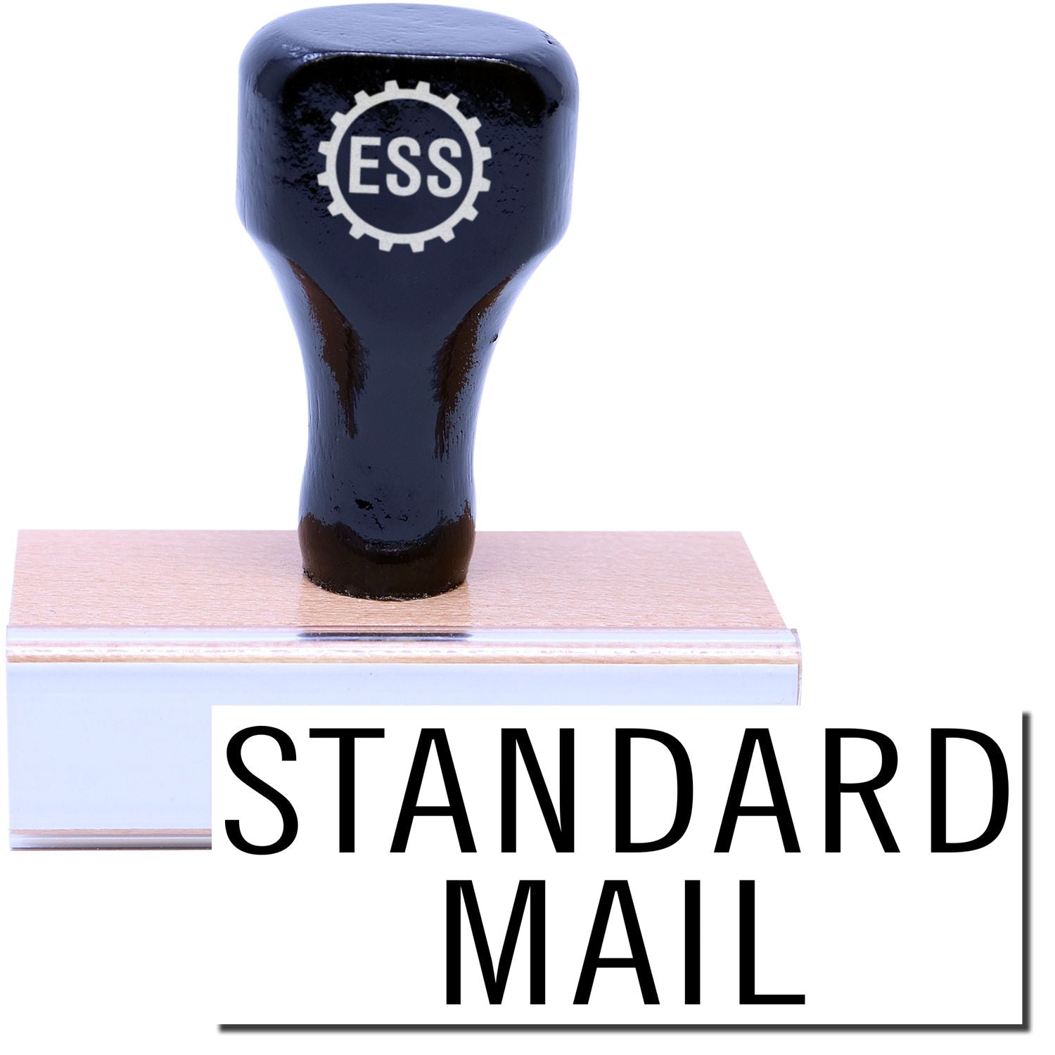 A stock office rubber stamp with a stamped image showing how the text STANDARD MAIL in a stacked font is displayed after stamping.