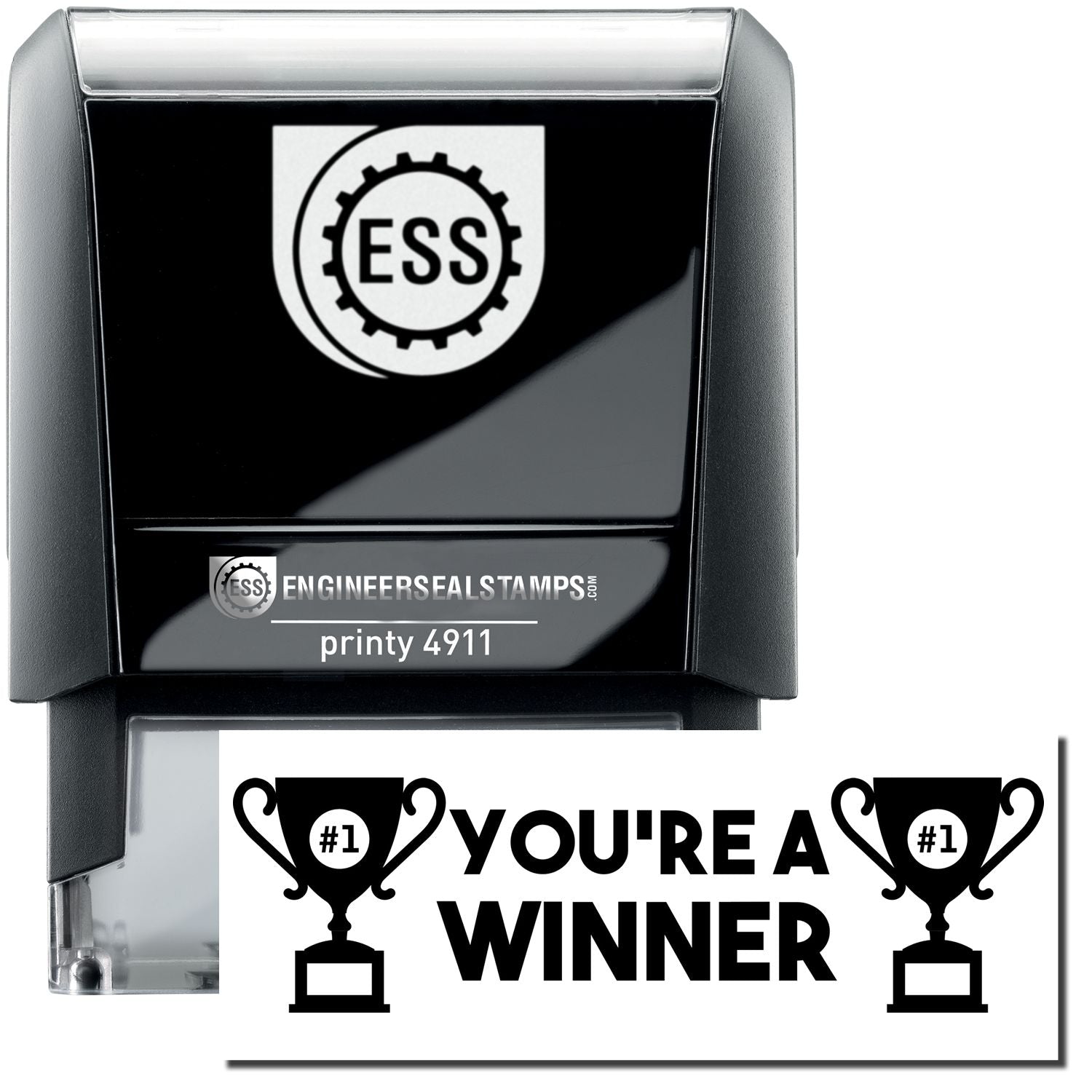 A self-inking stamp with a stamped image showing how the text YOU'RE A WINNER (in bold font with images of a trophy with #1 inside on each side) is displayed after stamping.