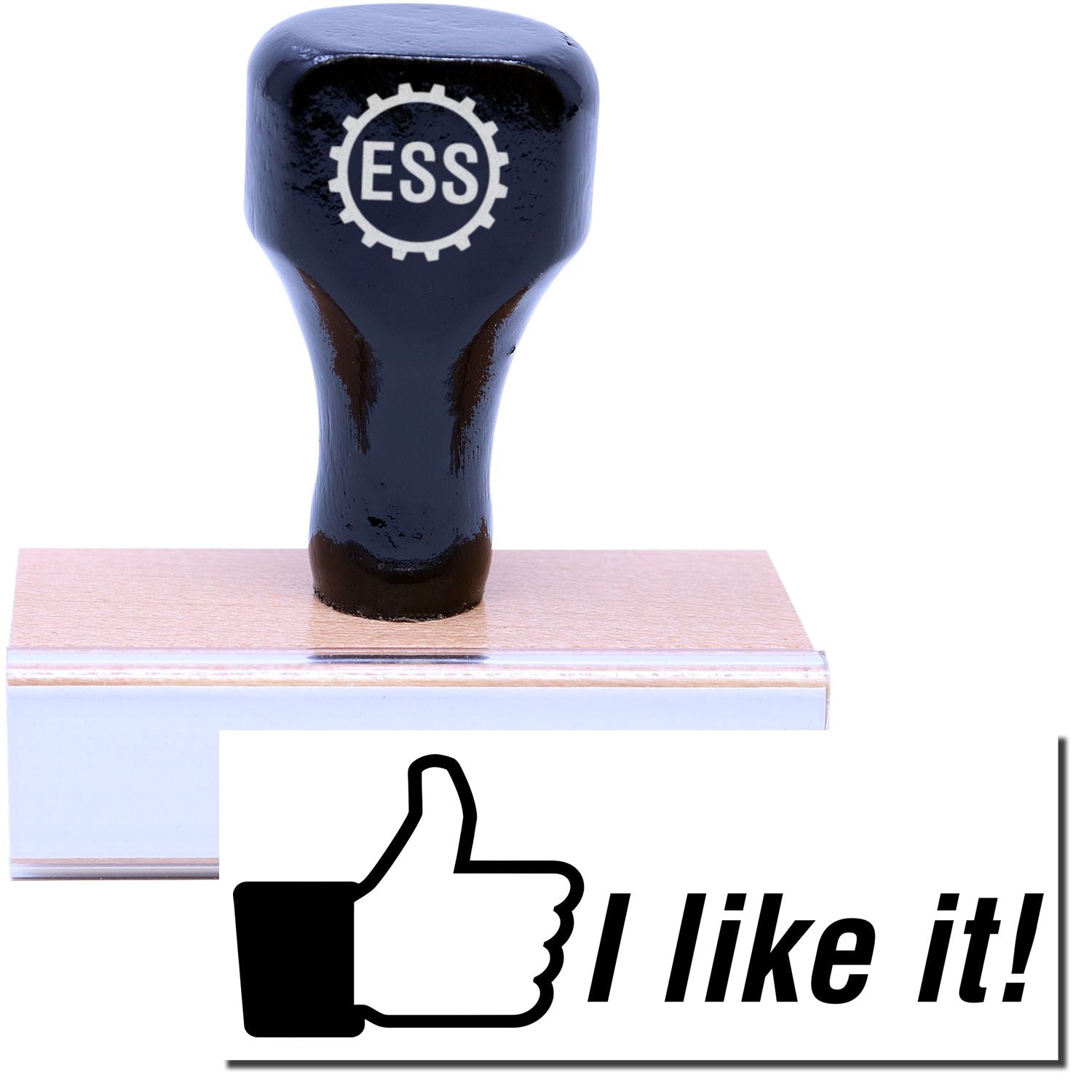 A stock office rubber stamp with a stamped image showing how the text I like it! with a thumbs-up icon on the left side is displayed after stamping.